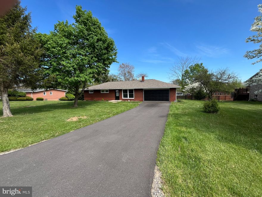 This gorgeous, renovated, one-story ranch home in the mountains of Western Maryland is nestled in the Braddock Estates neighborhood. . The 3-bedroom, 2 bath home, with a 2-car garage, will give you generous space to move about (without losing that quaint, cozy atmosphere).  The open concept floor plan and spacious yard make it ideal for entertaining. Enjoy a quiet summer evening relaxing on the stone patio out back. The living space looks like it came out of a magazine. Laundry room is easily accessible on the main floor, with a large pantry closet located adjacent to it.  The owner just updated many of the features including paving the driveway, fencing in the entire backyard, replacing all of the gutters, new windows throughout the house and new doors. The windows have a lifetime warranty that is transferrable to the new buyers! This property is located just minutes from Interstate 68, Frostburg State University, and all amenities.