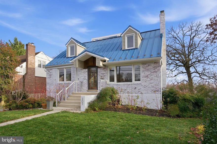 A stunning reimaagination of a classic Catonsville Cape Cod awaits! The contemporary front porch hints at what's to come as you enter through the living room with its custom built-ins. Then dicover the European-inspired kitchen with white contemporary cabinets topped with granite, Italian leather-textured porcelain tile floors, and stainless appliances including a Dacor gas range. And then the rear addition -- a stunning, cathedral-ceilinged family room with window walls overlooking the main deck, a gas fireplace, and Minka fans overhead. The primary bedroom, a study, and a full bath are on this main level. Upstairs -- the second bedroom has an overlook into the family room, as does the third bedroom, while the fourth bedroom has the charm of an original dormer. There's a full bath  here of course. And stairs lead to the roof-top deck with its outdoor kitchen, gas fire pit, and a vista that includes even the fireworks in Baltimore's Inner Harbor! Finally, the lower level has a clubroom or exercise room, half bath, workshop, storage area and laundry, all with the coolest sea blue epoxy floor. Access to the two garages, one with an EV charger, and back yard are here as well.  Seller reserves right to request that buyers get second opinion from lender of seller's choice.