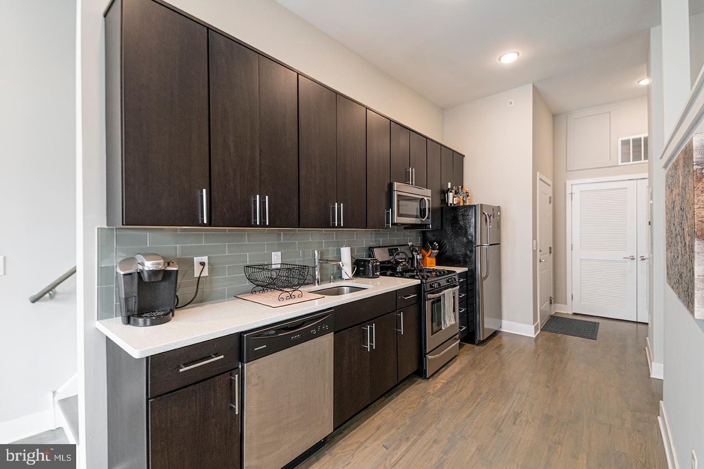 *NOW WELCOMING IN-PERSON TOURS!! - MASKS REQUIRED* Nothing short of luxury exists here! This top floor junior 1 bedroom, 1 bathroom in the YWCA Building has everything you're looking for and is within walking distance to one of the many bars, restaurants, shops and boutiques Center City has to offer! Take the elevator to the third floor and step into a bright living space flooded with natural light from the floor to ceiling windows and sliding glass door that leads to a Juliette balcony. The kitchen is complete with glass tile back splash, quartz counter tops, modern cabinetry with sleek hardware and stainless steel dishwasher, refrigerator, microwave and electric oven/stove. The bathroom features up to date subway tile and gorgeous vanity to match! The lofted bedroom is spacious and includes a double closet. Best of all, at the end of the day you can head on up to your PRIVATE ROOF DECK!! You will also enjoy: - Junior 1 bedroom, 1 full bathroom - Elevator building - Secured entry - Trash room - Bike room - Wi-Fi enabled thermostat - Central air and gas heat - Comcast Cable and Verizon Fios ready - Front loaded washer/dryer in unit *Sorry, this unit is strictly no pets* *Price reflects a 2 week credit for a 12 month lease!* Please call to schedule an appointment for a showing!