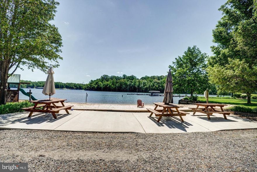 Motivated Seller! Water access lot on the private side of Lake Anna in a coveted subdivision. Bring your lake toys and enjoy the lake while you build. Deeded boat slip. Soil work completed for a conventional septic system.