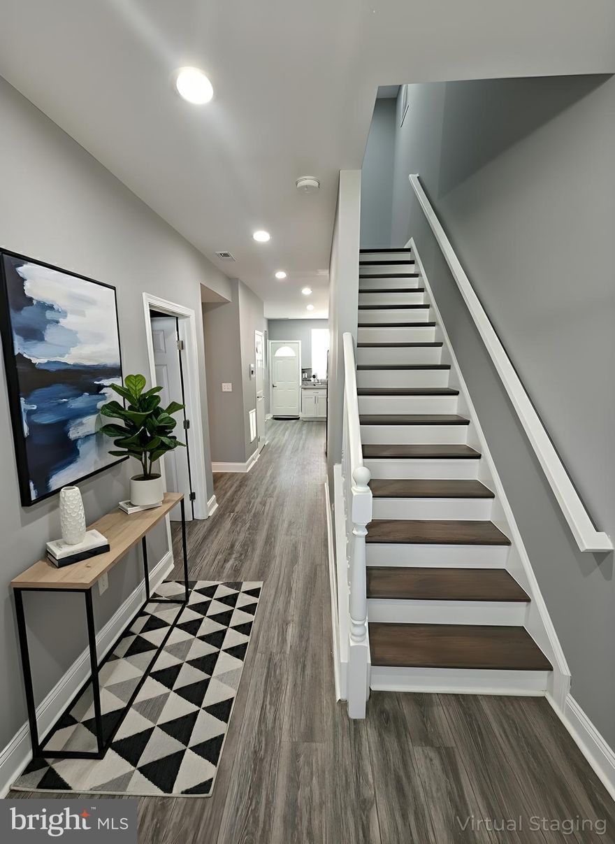 PRICE REDUCED! This fully gutted and beautifully renovated inside-group rowhouse in Baltimore’s Langston Hughes neighborhood offers a modern layout perfect for a large family or an investor seeking extra rental income. The home features 5 spacious bedrooms and 4 full baths, including a basement bedroom with egress, tiled bath, and full laundry room.

Everything is brand new—HVAC, electric, plumbing, gas, water lines, roof, windows, and doors. The new kitchen includes new cabinets, granite countertops, energy-efficient appliances, LED lighting, and water-saving fixtures. LVL waterproof flooring runs throughout.

Enjoy the restored original brick façade plus a new front porch and a rear deck for outdoor living. The private 6-ft fenced yard includes an 8-ft gate and concrete parking pad.

This turnkey home blends historic charm with modern upgrades and qualifies for up to $10K Vacant to Value grant, $5K Live Near Your Work, and Buying Into Baltimore programs.  Some photos are virtually staged.