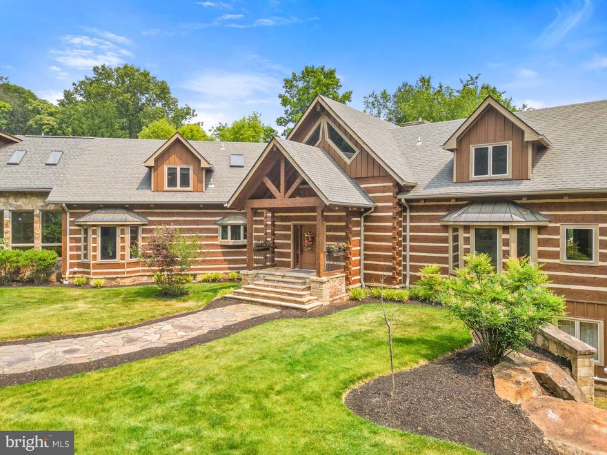 Enter through the classic stone pillars and gates down the country lane to this very special Western Loudoun estate.  Must see estate offers a one of a kind custom designed home w/  7,950sf of living space, a well planned 4 stall barn w/ upper level 1,800sf 2 bedroom 1 bath apartment all  sited on  2  private adjoining lots for a total acreage of 37.26!  Home delivers a unique blend of comfort &  luxury  in a very private and tranquil setting.   Light filled retreat offers views of nature from every direction.  Attention to quality details & craftsmanship is obvious as you tour.  Entire property reflects pride of ownership and has been well maintained, detailed owner records will be available for all interested parties.  Residence is a stunning combination of hewn log, heavy timber w/ stone accents.   Spacious & thoughtful floor plan consists of 3 levels.  Of special note is the 2 primary bedroom ensuites, one on the main level and one on the upper level, both are outstanding in their own way.  Main level primary includes a private screen porch, gas fireplace, loft sitting room & beautiful bath - great guest suite option too.  Upper level primary suite is an architectural dream, it includes  a private porch w/ lovely views, rich hardwood floors, sitting area w/ gas fireplace, built in dresser, 2 walk in closets, wet bar, and skylights positioned so you can star gaze from your bed.  Lavish primary en suite bath features a lovely spa shower dressed in timeless marble of white & gray tones, a soaking tub , dual custom vanities, a cosmetic vanity and private water closet.  Zoned radiant heated flooring throughout the main level, garage and upper primary bedroom are just one of  numerous upgrades.  Main level hosts an open floor plan including expansive family room w/ floor to ceiling gorgeous stone fireplace , beautiful gourmet kitchen w/ walk in pantry is  sure to please the chef in the family, dining room  and sunroom adorned w/ windows and peaceful outdoor views - all fabulous areas for entertaining!  Large  mudroom has separate entrance convenient to the outdoors and barn includes laundry, generous closets and full bath.  Main level office w/ more great views .  Light filled rear foyer from garage includes 2nd staircase to upper level.  Upper level includes bonus loft room, primary bedroom ensuite,  2 generous bedrooms w/ shared  bath and custom  window seat nook ideal for reading and 2nd laundry closet.   Lower level has something for everyone to enjoy, theatre zone , pool table,  game table area, wet bar, wine cellar, craft room, huge cedar closet, mechanical room, entry to 1 car side load garage and large area with rough in for future full bath & kitchenette if desired.  Expansive rear deck with stone fireplace or nearby hot tub are perfect spots to enjoy the best of nature's beauty, listen to the birds sing, watch the wild turkeys and deer roam!  The property is a lovely blend of open gentle rolling pastures and some woods.  The barn offers 4 horse stalls, concrete aisle, birthing stall, workshop and tack room.  Tack room features radiant heat, cabinet storage, counter space , full laundry, bathroom w/ sink & toilet.  Upper level of barn  is a delightful  fully equipped 2 bedroom, 1 bath apartment w/ deck that has wonderful  pasture & mountain views,  currently tenant occupied.  Barn and apartment have separate utilites .  Pastures have several watering stations w/ frost- free faucets, run in sheds, some board and small animal fencing.  Winning combination of home & land is minutes from the quaint Hillsboro village, top rated wineries and breweries.  Conveniently located  3.5 miles from Rte. 9, short drive to Purcellville, 30 minutes to Downtown Leesburg, 30 minutes to Point of Rocks MARC Train Station and an hour drive to Washington Dulles Airport.  
Residence with barn on 30.37 acres AND vacant lot of 6.89 acres are both included in the price, total acreage 37.26!  Awesome lifestyle opportunity at an excellent value!