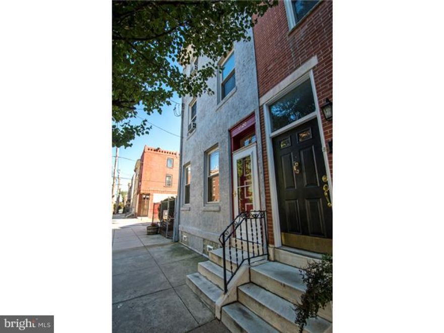 Price Repositioned!!!  50K Drop In Price.. Sellr Wants End of YEar Settlement!! This is a Fabulous Price For This Almost 2000 Square Foot Home, Only 2 Blocks From The Main Strip In South Street and 2 Blocks From Center City; Fabulous Twin Home Located In A Very Sough-After Street In South Philly; Tons of Off Street Parking; Brick & Stucco Home Is A Must See!  Beautiful Original Wood Work & Moldings, 10 Foot High Ceilings, Overhead Lighting, Newer Windows & More! Living Room & Dining Room Are Spacious With An Elegant Wood Trim Entrance; Totally Updated Kitchen With Pergo Flooring, Brand New Stainless Steel Appliances, Tons Of Cabinet & Counter Space & Newer Counters; Full Finished Basement Makes For a Great Family Room, Recreation Room, Play Room or Office; New Front Door; Master Bedroom Suite Is On The 3rd Floor w/a Full Bath; Additional Bedrooms Are Generously Sized & Share A Squeaky Clean Hall Bath; Large Laundry Area and Floored Attic With Added Storage; Roof Only 6 Years Old, Recently Re-coated,Brand New Hot Water Heater, & Brand New 220 Amp Electrical Panel; This Home Is Priced To Sell!; Lot Next Door Has Been Sold; Don't Miss Out This Won't Last Long AT This New Price!!!