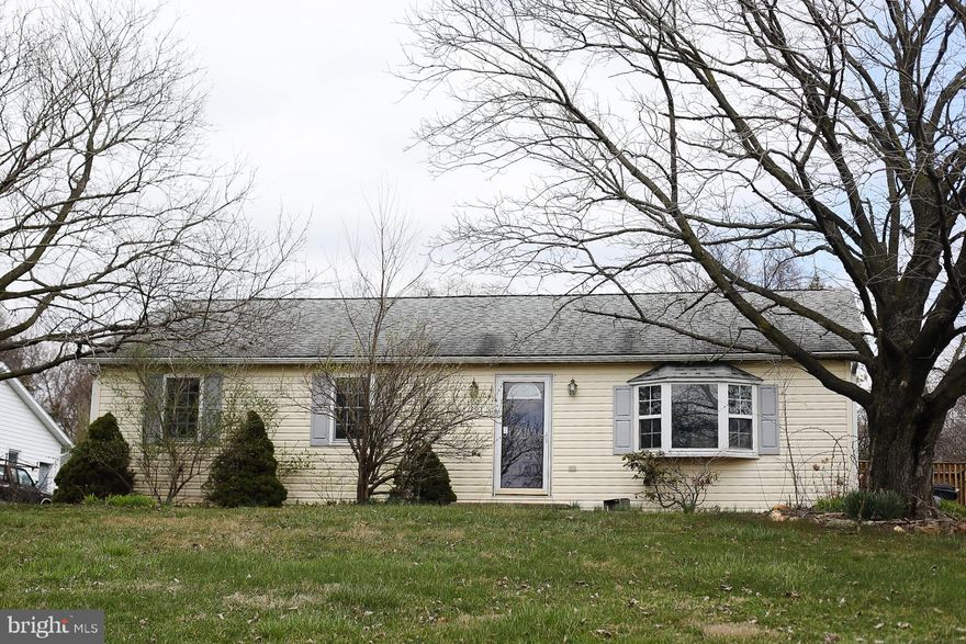 Spacious Rancher in a beautiful country setting.  The home was renovated a few years ago.  Newer replacement windows, siding and kitchen.  Large kitchen with maple cabinets, newer appliances and an island.  Hardwood Floors through out.  The lower level family room has plenty of room for entertaining with still ample storage room.