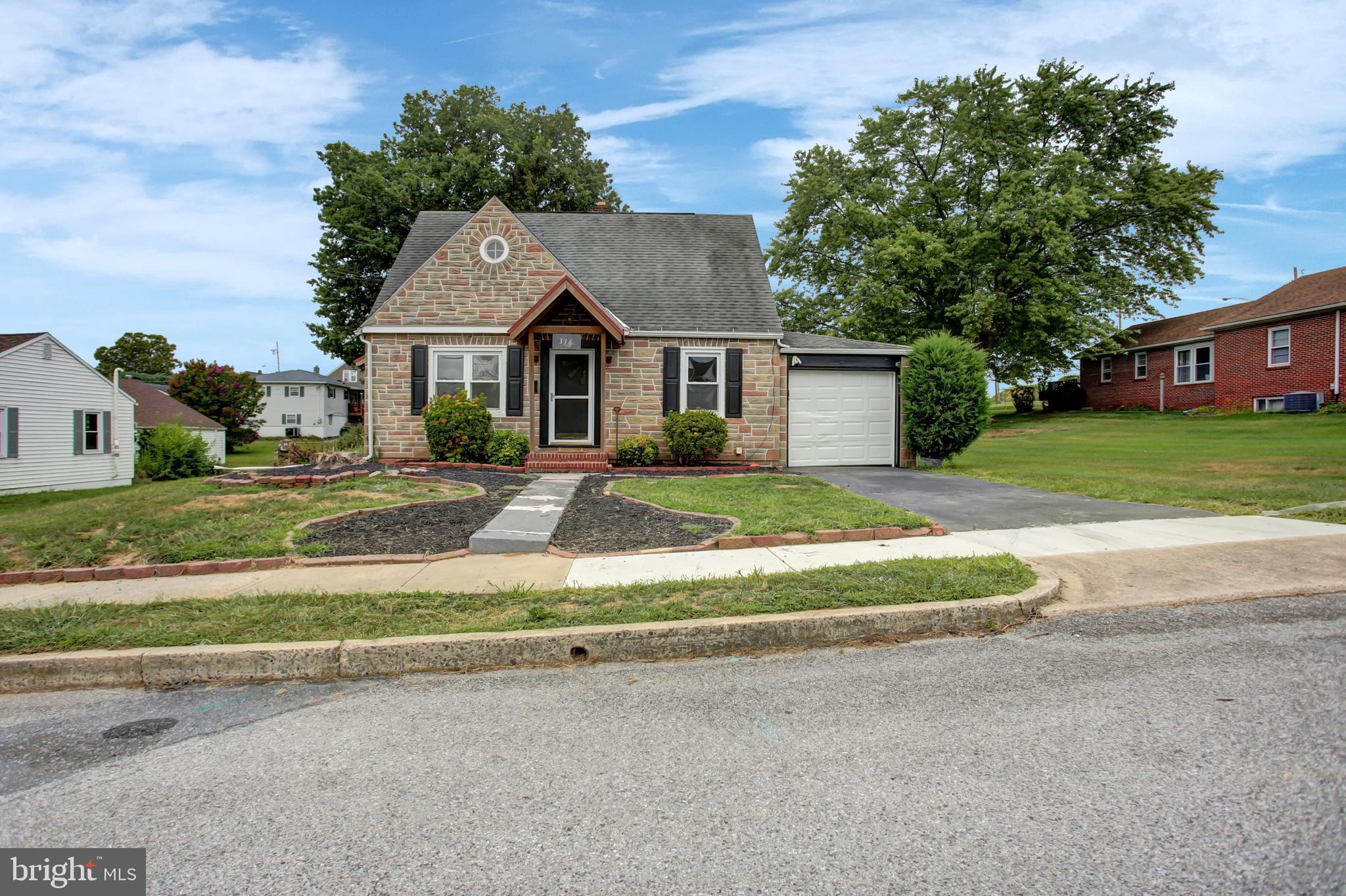 Come check out this beautiful 3 bedroom, 1.5 bathroom home! Renovated and ready for you to move in and make it your own. The kitchen has new cabinets, countertops and appliances. The whole home has fresh, bright paint and the hardwood floors have been brought back to life. The basement has a finished family room and there is an oversized attached garage with plenty of storage.