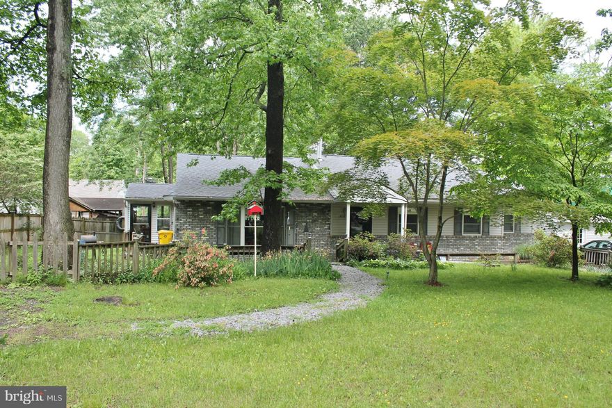 Nice rental close to water in Woodland Beach. 3 bedrooms, 2 baths, large family room that leads into dining and kitchen areas. Additional living room near entry. Screened porch on back/side. 2 driveways, plenty of parking. Home is bigger than it appears from outside. Close to community playground and water access. Absolutely no pets. No smoking.