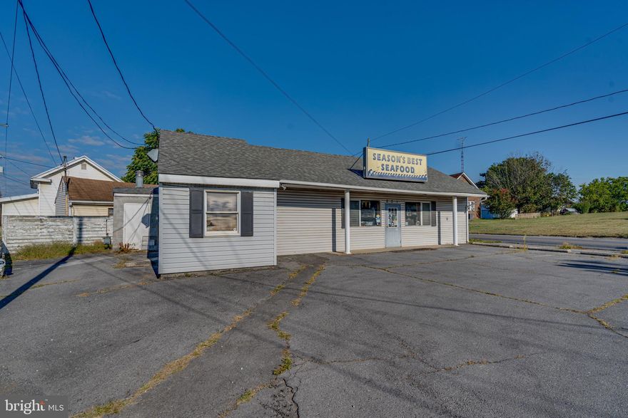 Great opportunity to continue a business that was open for 29 years - Season’s Best Seafood or start a new venture.  Located on the corner of E Moler and Woodbury Ave in Martinsburg, WV. Per the WVDOT between 13,000 and 15,000 vehicles per day pass by this location (Please do your own research).  1,134 square feet with a bathroom including shower. All equipment conveys. Would be a great location for Pizza delivery/take out. Possible real estate or insurance office. So many possibilities. Recent HVAC system and roof. Paved parking. Call for more details and to discuss.
