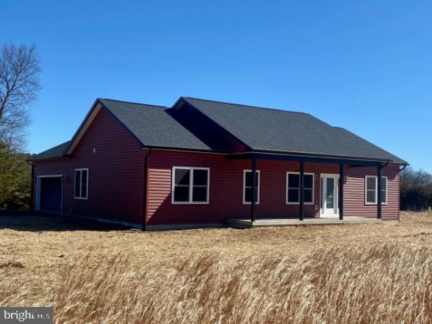 Bring your custom vision to life! Build your dream home on this beautiful 5-acre lot conveniently located off Huyett Road and Summit Point Road in Charles Town. This made-to-order Ott model by Hepler Homes offers the ideal blank canvas to create your ideal living space. With three bedrooms, two and a half bathrooms, and a spacious main-level layout, this home plan provides the perfect foundation for main-floor living. Featuring an unfinished basement, attached one-car garage, granite kitchen countertops, and stainless steel appliances, this home is not only well-equipped, but invites your custom touches! This is country living at its finest with five private acres situated just minutes from charming downtown Charles Town. The Virginia line is only 10 minutes away, too, making this a perfect location for NOVA commuters. Let your imagination run wild and make this blank canvas your own. Don't delay - schedule your visit today! 
Note: The lot is also being sold separately, as well.  Due to site work on an adjacent lot, please do not drive past the the right hand turn on the access road. Thank you! This listing is in partnership with the lot owner and Hepler Homes. Other floorplans and models are available!!! Additional charges may apply. Please ask for details.