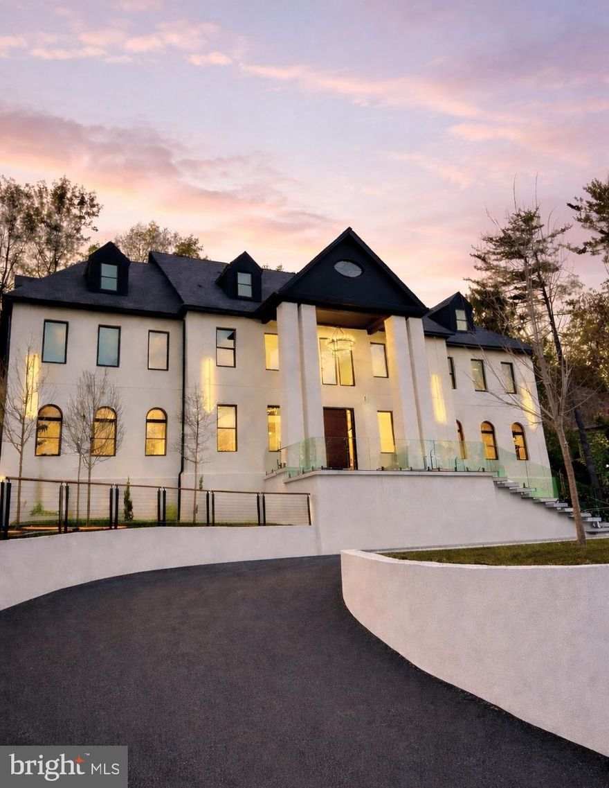 A rare offering in the heart of McLean, this like-new construction modern estate spans over 11,500 square feet across four meticulously designed levels, delivering a level of scale, privacy, and sophistication seldom available in the Washington metropolitan area.

Conceived for both formal entertaining and everyday luxury, the residence features eight bedrooms, nine full baths, and two half baths, including a main-level guest suite and a seamless integration of grand entertaining spaces with more intimate living areas.

At its center, a chef’s kitchen with adjoining scullery is designed to accommodate elevated hosting, supported by expansive living and dining environments framed by natural light and clean architectural lines. A three-stop elevator provides effortless access throughout.

The outdoor experience rivals that of a private resort—anchored by a pool, multiple decks, and a covered pavilion with grilling area, offering a refined setting for gatherings or quiet retreat.

The lower level is dedicated to wellness and leisure, featuring a fully equipped gym, sauna, and additional recreation spaces, creating a true in-residence retreat.

Positioned minutes from Langley and the CIA headquarters, and within a security-monitored enclave, the property offers a unique combination of discretion, accessibility, and prestige.