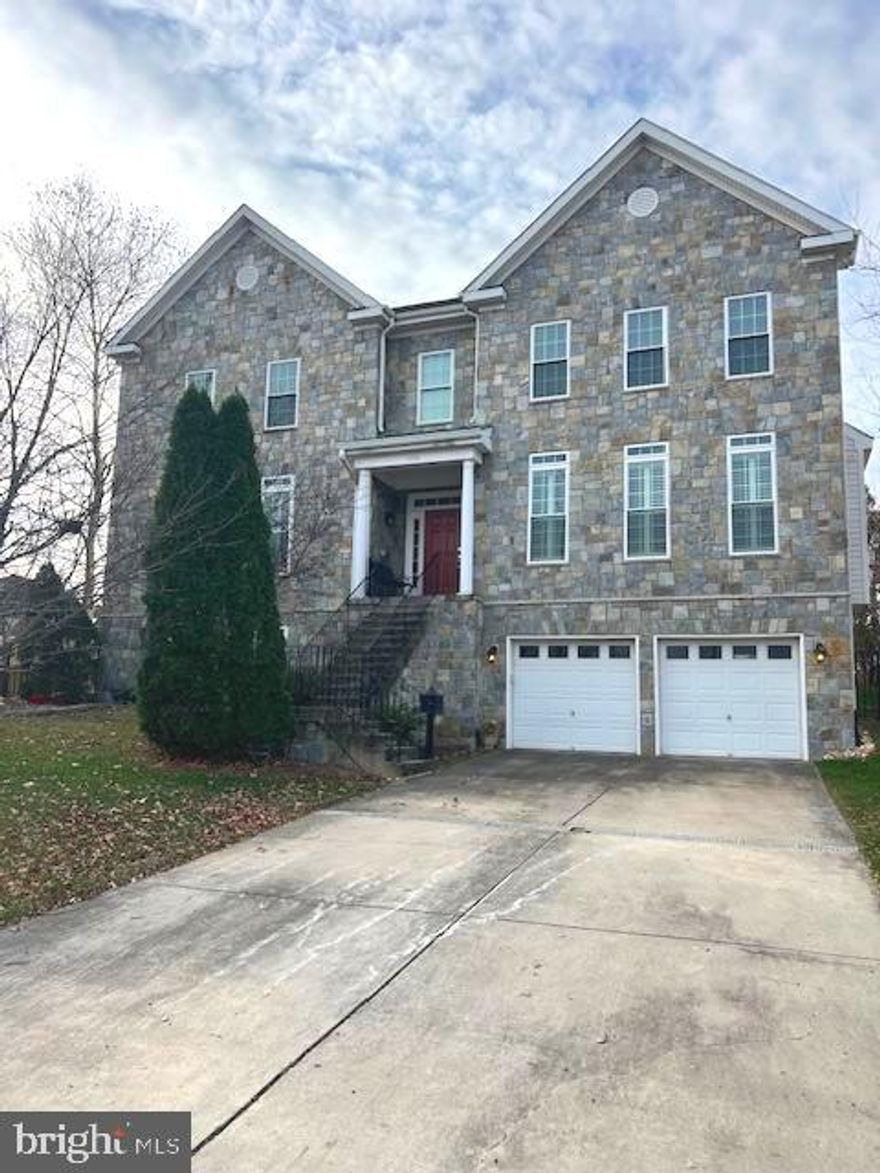 Welcome to 1436 S. Dinwiddie St., a stunning luxury home in the sought-after Claremont neighborhood of Arlington! This 3-level, 5-bedroom, 4.5-bathroom residence spans an impressive 3,514 sqft and boasts a striking stone-front exterior, gleaming hardwood floors throughout, and soaring 10-foot vaulted ceilings. The upper level features 4 spacious bedrooms, including a primary suite with a private bathroom and a large walk-in closet, as well as a convenient laundry room. The basement level offers a large family room with cozy carpeting, a guest bedroom, and a full bathroom—perfect for visitors or additional living space. Outside, enjoy a beautifully landscaped yard with a BBQ area and a large deck, ideal for entertaining. With a 3-car garage plus 4 exterior parking spots, this home is just minutes from shopping, dining, public transportation on S. Dinwiddie Street, and major routes like Route 7, Walter Reed Dr., S. George Mason Dr., and I-395. Outdoor enthusiasts will love nearby nature trails, Barcroft Community Center, and Wakefield Aquatics Center. Don’t miss this exceptional blend of luxury and convenience!