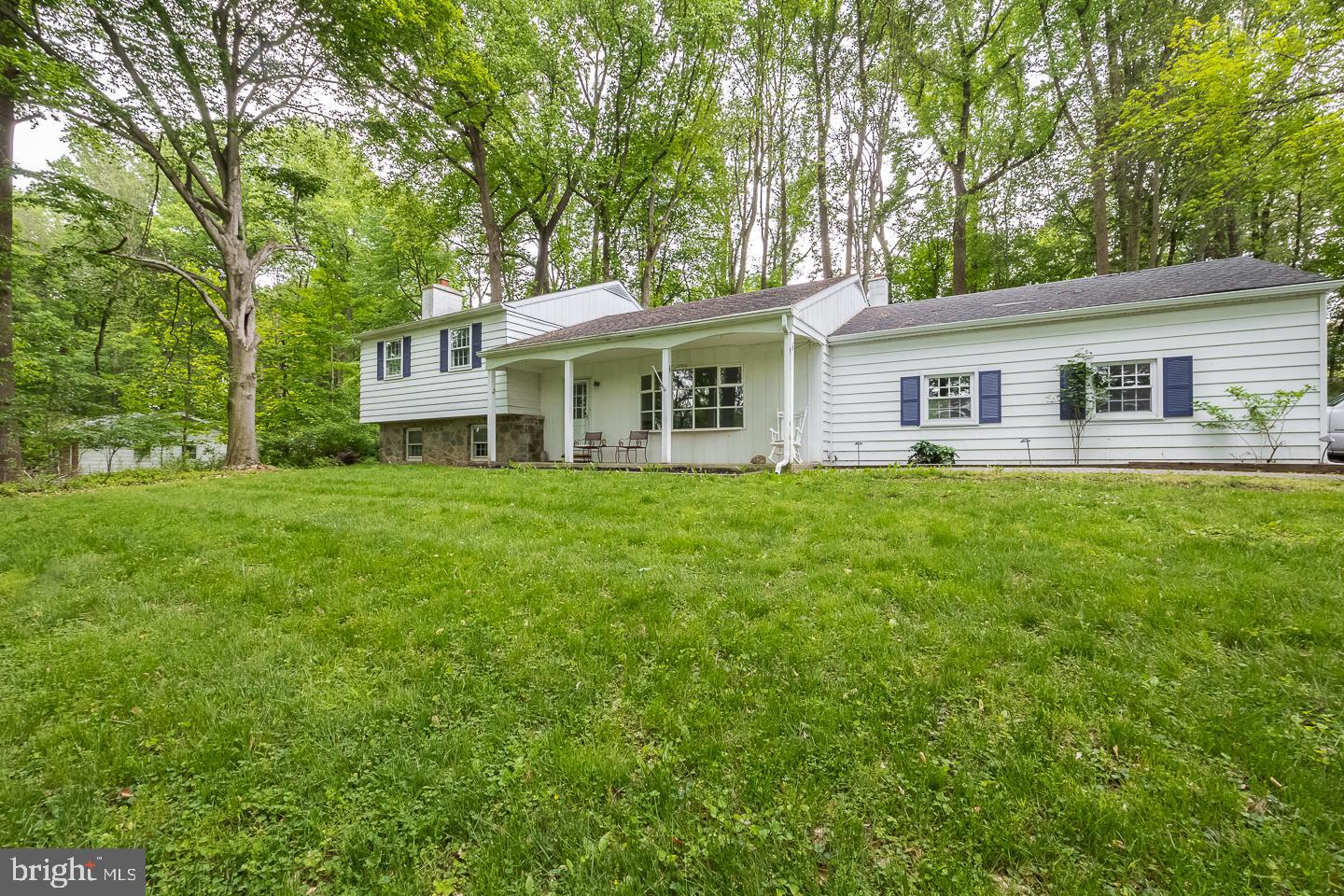 Welcome to 100 Morris Road, where exceptional craftsmanship meets serene countryside living. Nestled in the picturesque rolling hills of West Caln Township, this meticulously maintained home offers a perfect blend of spaciousness, comfort, and convenience. Enjoy the beauty of the wildlife from the large open space across the street.  With  Layton Park, Coatesville Country Club and the reservoir within walking distance, you'll have endless opportunities to explore nature's beauty.  For those who enjoy leisurely pursuits, indulge in a round of golf, the swimming pool or evening dinners at the nearby Coatesville Country Club, adding a touch of luxury and recreation to your lifestyle.  As you step inside, you're greeted by a well-designed open floor plan on the main level with the newly refinished original hardwood floors. The main floor features a generous living room, dining room, and kitchen. The kitchen holds an abundance of cabinetry, large countertop space & a convenient pass-through to the formal dining rooming making entertaining a breeze.  The heart of the home awaits just a few steps down in the cozy family room, adorned with a magnificent stone fireplace, ideal for creating warm memories on chilly evenings. Convenience meets functionality on the lower level, where you'll find a convenient laundry room, a half bath, a versatile fourth bedroom, playroom or office space for the ever changing family needs with its own entrance. Ample storage, including a cedar closet—perfect for keeping your belongings organized and easily accessible. Ascending a few steps from the main level leads you to three spacious bedrooms, a full hall bath, and a master bath. Abundant closet space ensures that storage woes are a thing of the past, while recently refinished pristine hardwood floors and a freshly painted neutral color scheme along with modern lighting finishes make it move it ready. Also enjoy attached 2 car garage. Outside, the home exudes curb appeal. The lot offers plenty of space for outdoor enjoyment and relaxation. Conveniently located just minutes from major highways, including Rt. 30, and railway stations, this home offers the tranquility of the countryside without sacrificing accessibility to urban amenities. Don't miss your chance to experience the best of both worlds in a neighborhood that is hard to beat—schedule your showing at 100 Morris Road today and make this exceptional property your new home sweet home!