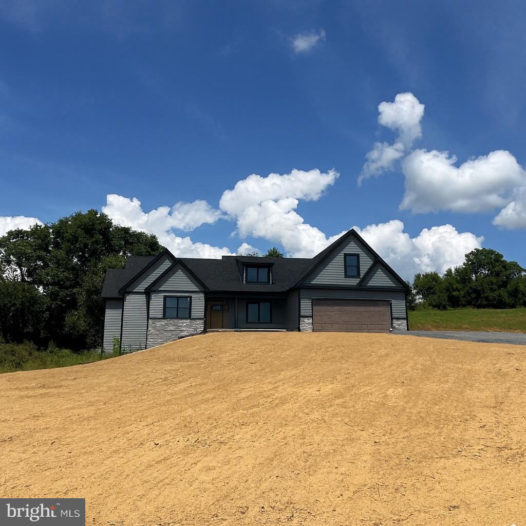 This Rancher boasts a unique floor plan in the beautiful Community of High View Estates, your own spacious 3.1+ acre lot. This is the premier lot in the subdivision. This home features a front covered porch to enjoy all of the wonderful scenery. This home features 3 BR, 2.5 BA,, living room with cathedral ceilings, kitchen includes an island, stainless steel appliances, and granite countertops, master bedroom has tray ceilings and a private bathroom with a tiled shower and separate tub, & 2-car garage with opener. House can be completed in 30 days.