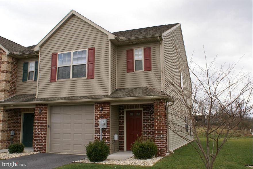 Beautiful 3 bedroom, 2.5 bath Town home with one car garage.  Granite counter tops and ecramic tile floors in kitchen and Bathrooms; 2nd floor laundry hook up. Rent includes lawn care and snow removal on public sidewalk in front.
