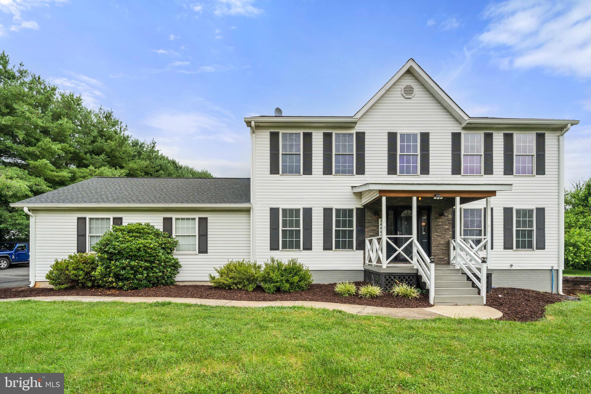 Welcome to 34444 Leesburg Pike in Round Hill, VA—a beautifully updated home that perfectly balances modern upgrades with serene mountain charm. The fully remodeled kitchen is a standout feature, boasting brand-new stainless steel appliances, updated cabinetry, and sleek countertops, making it both functional and stylish. Throughout the home, you'll find brand-new flooring that ties each space together with a fresh, contemporary look. The bathrooms have been thoughtfully remodeled with updated fixtures and finishes, offering a modern feel.
Comfort and efficiency are key in this home, with a new dual-zone HVAC system under a 10-year warranty and a roof that's only four years old, giving peace of mind for years to come. The finished basement provides flexible space for a home office, recreation room, or guest suite, expanding the home’s living potential.
Outside, enjoy the expanded back deck—perfect for relaxing or entertaining—alongside a custom Solo Stove fire pit for cozy evenings. The property has been carefully landscaped with new trees and a French drain system designed to manage mountain runoff. A newly paved driveway and parking pad, along with new garage doors and a fresh front walkway, enhance both curb appeal and functionality.
Every detail of this home has been upgraded for comfort, style, and livability. Set against the scenic backdrop of Round Hill, 34444 Leesburg Pike offers the perfect blend of modern living and natural beauty—ready for you to move in and enjoy.