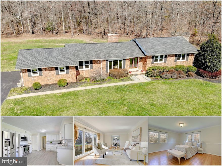 This spacious one-level brick rambler sits on a rare,  flat 1.47-acre lot in a quiet neighborhood and has been both lovingly maintained and professionally updated.  Inside, the home has an abundance of character with decadent crown molding, a combination of beautiful hardwood and LVP floors, and sun drenched common areas.  The newly renovated kitchen features stainless steel appliances, soft-close shaker style cabinets, elegant quartz countertops, and a stylish subway tile backsplash. The kitchen opens seamlessly into the living room, highlighted by a stately brick fireplace.  The natural light filled living and dining areas have beautiful hardwood floors and make for the perfect place to host family and friends. New luxury vinyl plank (LVP) flooring adds durability and modern appeal in the kitchen, laundry room, and bonus room while the original hardwood floors flow through the living and dining areas, continuing through the hallway to the primary and secondary bedrooms. The generous primary suite includes a well-appointed bathroom and a large walk-in closet with built-in organizers. The dedicated makeup vanity area is sure to become a favorite part of your morning routine!  A bonus feature is the fourth bedroom/recreation room, created by converting the two-car attached garage. This versatile space offers a private separate entrance and its own heating and cooling system, making it ideal as a rec room, home office, playroom, or comfortable in-law suite. Downstairs, the expansive unfinished, walk-up, basement provides enhanced flexibility and instant sweat equity potential. Finish the basement to your taste for additional living space, or utilize the abundant storage it offers. Outdoors, you’ll love the large back deck with a fixed canopy for shaded relaxation, plus an oversized storage shed perfect for lawn equipment, tools, or outdoor toys. The huge, flat, cleared lot is truly a blank canvas for everything from family gatherings and gardening to sports and future dreams. Pride of ownership is evident throughout this move-in-ready home on one of the largest cleared lots in the area.  Recently installed holding tanks; two 2,000 gallon tanks.