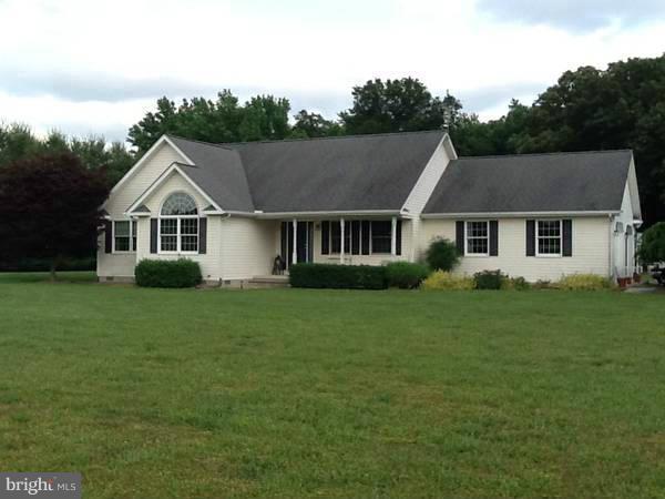 Beautiful well kept rancher on 2+acres, features 3 bedrooms, 2.5 bath, open living room w/cathedral ceiling, hardwood floors, built-in book cases and stone fireplace. Kitchen w/island, master bedroom w/full bath dressing room & walk-in closet, separate laundry room, screened-in porch, 2 car garage and nicely landscaped.