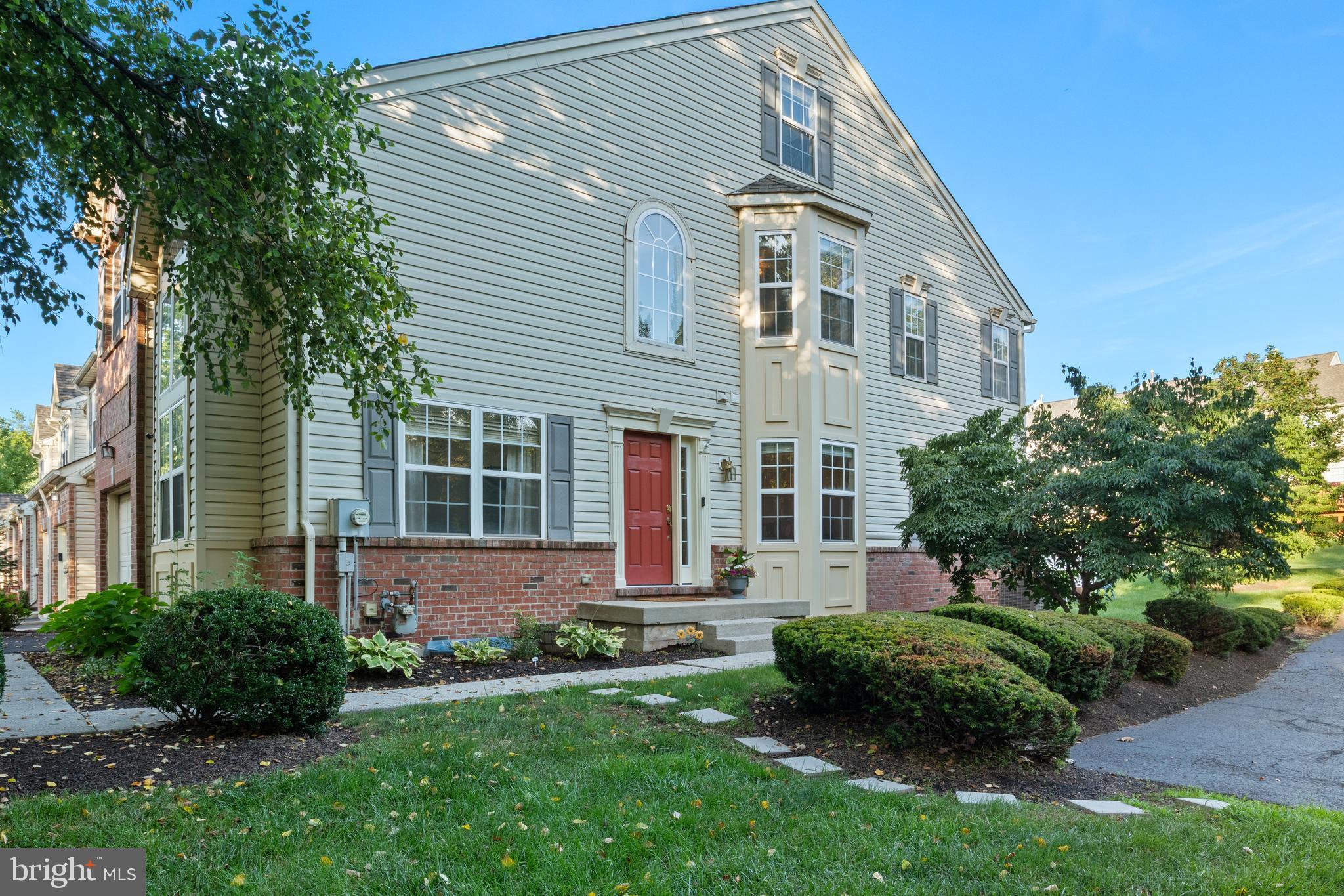 Nestled on a quiet U-Shaped court, this stunningly neutral, 4 Bedroom, 2.5 Bath END Unit Townhome has been lovingly maintained and improved upon. As one enters the side facing front entrance, it has that immediate feel as if you were entering a single family home – something not always found in most all Townhomes. Standing in the 2 Story, sun-filled Foyer, one will immediately notice the gleaming Luxury Vinyl Wood Plank flooring which flow seamlessly throughout the main level. The Volume Ceiling Living Room located to the left of the Foyer could easily be set up as a play area for the little ones or even as an elegant main floor Office. Be sure to note the walk-in Bay window found in the Dining Room. The formal Dining Area located to the right of the Foyer can hold any sized Dining Room Table so if one is hosting the Thanksgiving meal, the entire family can have a seat at the table. (In many Townhomes this space is very limited.) To the back of the home is the Family Room, the center piece of which is the cozy Gas Log Fireplace. Here is the perfect spot for relaxing or entertaining. The heart of the home is the well-lit, 2 toned Island Kitchen with 5 Recessed Lights. From the special wood block Island countertop to the extra deep kitchen sink, touch motion faucet, pull out drawers from the lower cabinets and a Pantry makes this a Kitchen any “Chef” would be proud of. To the side of the Kitchen is the informal Eating Area with replacement glass pane door leading to the spacious Deck - Great spot to cook up burgers and dogs! Upstairs, the Primary Bedroom offers ambiance with its’ Vaulted Ceilings, Lighted Ceiling Fan, a spacious Walk-In Closet and an updated en-suite Bathroom. The remaining 3 Bedrooms offer peaceful retreats all having lighted Ceiling Fans. The spacious 3rd Floor Loft complete with 2 Skylights serves as the 4th Bedroom but could easily be a home Office if needed. (Be sure to note, that having a real 4 Bedroom Townhome – meaning all bedrooms above grade, sets this apart from competition.) Convenience meets comfort with a 2nd-floor laundry area equipped with a brand-new washing machine, making laundry day a breeze. In addition, both full bathrooms have been recently updated, adding fresh, modern touches to your daily routine. Completing the floor plan, the large unfinished basement offers endless potential for your lifestyle — creating a home gym, rec room, or just a great spot for extra storage. Within the lpast several years, several major systems and finishes have been upgraded, including new siding on one section of home, a new AC unit, new water heater, new carpet in Loft, gleaming Luxery Vinyl Plank flooring throughout the main level of the home, newer front and rear doors, new garage door opener and a new driveway — all adding value and peace of mind. As one walks through this home you will discover the warmth, character, and possibilities as this home offers peace, privacy, and extra parking nearby for family and friends. You will feel at home the moment you arrive and ready to make new memories.