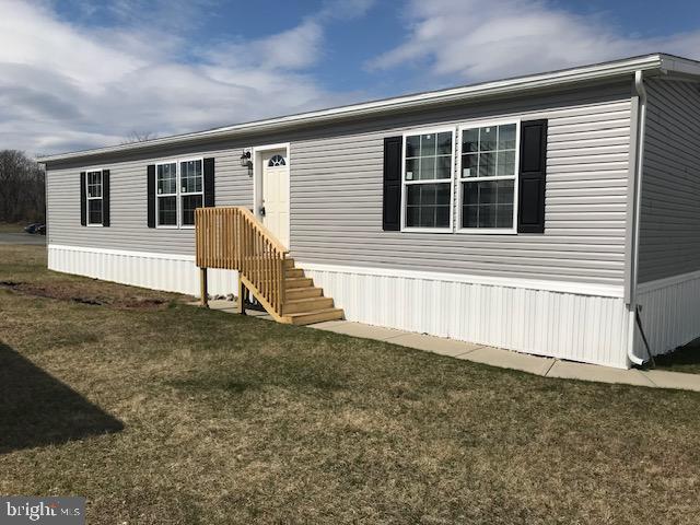 Open concept living! Living room opens to the kitchen and dining areas. Kitchen has a large island, pendant lighting, recessed lighting and beautiful cabinetry. Primary bedroom has a spacious beautiful master bath. Come see this lovely 3 bedroom 2 bathroom home!