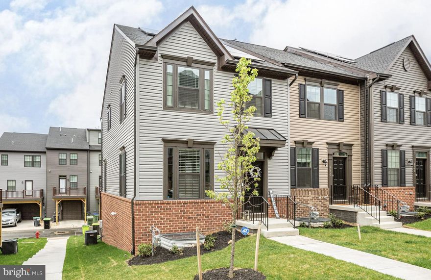 Nearly new and meticulously maintained, this end unit three-level townhome in Fredericksburg Park offers modern finishes, flexible living space, and an unbeatable City location—only three years young and move-in ready. The main level welcomes you with luxury vinyl plank flooring, recessed lighting, and an open layout filled with natural light. The spacious living room flows into an upgraded kitchen featuring stainless steel appliances, gas cooking, quartz countertops, a large center island seating bar, pantry, and space for a dining table. Walk out to a low-maintenance rear Trex deck, perfect for morning coffee, grilling, or relaxing outdoors. 3 full bedrooms in upper level, including a primary suite designed for comfort. The primary bedroom with tray ceiling offers a spa-like bath with dual sinks, upgraded tile, and a large walk-in shower. Neutral finishes, ceiling fans, plush upper-level carpeting, and thoughtful details throughout create a clean, modern feel that’s truly move-in ready. Location. Location. Location! Step outside and connect directly to the Virginia Central Railway (VCR) Trail—walk or bike straight into Downtown Fredericksburg to enjoy restaurants, shops, parks, and historic charm. The VRE station is within walking/riding distance (only 1.4 miles) making commuting to Northern Virginia and Washington, D.C. easy. Alum Springs Park and nearby walking trails add even more outdoor appeal. With quick access to Route 1, I-95, commuter lots, hospitals, Central Park shopping, military bases, and new HOV lanes, daily convenience is unmatched. Fredericksburg Park is known for its walkability, sense of community, and ideal access to both nature and city amenities. This home offers the perfect balance of low-maintenance living, modern upgrades, and prime location. Call or email today to schedule your showing!