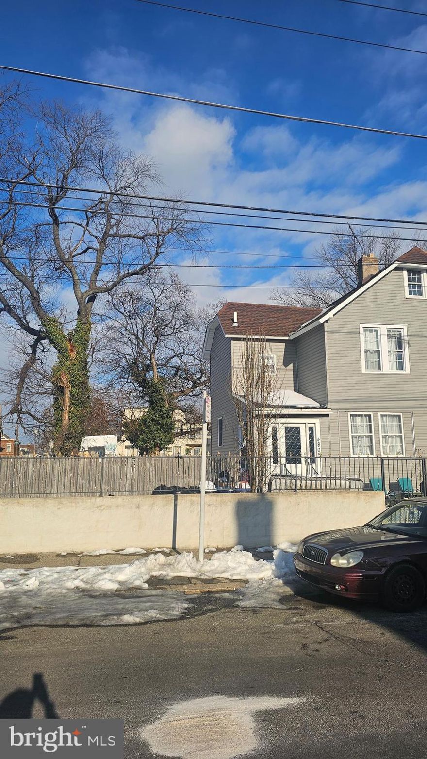 Welcome to 4805 Van Kirk Street, located in the desirable Northeast Philadelphia – Tacony section, conveniently close to Interstate 95 and a variety of neighborhood amenities. This spacious three-story twin home is now available for sale and offers excellent potential for an owner-occupant or investor.

The exterior has been significantly improved with newer siding, roofing, and windows. The interior is in the process of being renovated; some areas remain unfinished and will not be completed by the seller. The home is in livable condition and is being sold strictly AS-IS.

Enter into a formal foyer leading to a formal living room open to the formal dining room, adjacent to a large updated kitchen featuring abundant white cabinetry, stainless steel appliances, granite countertops, a beautiful ceramic backsplash, wood flooring, and a sliding door providing access to the large side and rear yards, as well as off-street parking. The kitchen also includes a closet with washer/dryer hookups.

The second floor offers two spacious bedrooms and a full three-piece hall bath with custom shower, vanity, toilet, and ceramic tile finishes. The third floor provides flexible space that can be used as the third and fourth bedrooms, home office, or bonus rooms.

Important: The adjacent vacant lot at 4801 Van Kirk Street (approx. 28’ x 100’) is available for an additional price and must be sold together with 4805 Van Kirk Street. The combined asking price for both parcels is $274,900. The extra lot provides exceptional side and rear yard space and potential for off-street parking or future use (buyer to verify zoning and permitted uses).

This is a rare opportunity to acquire a twin home with an adjacent lot in a desirable Northeast Philadelphia location close to major roadways, public transportation, and everyday conveniences.

Property needs work. Handyman special