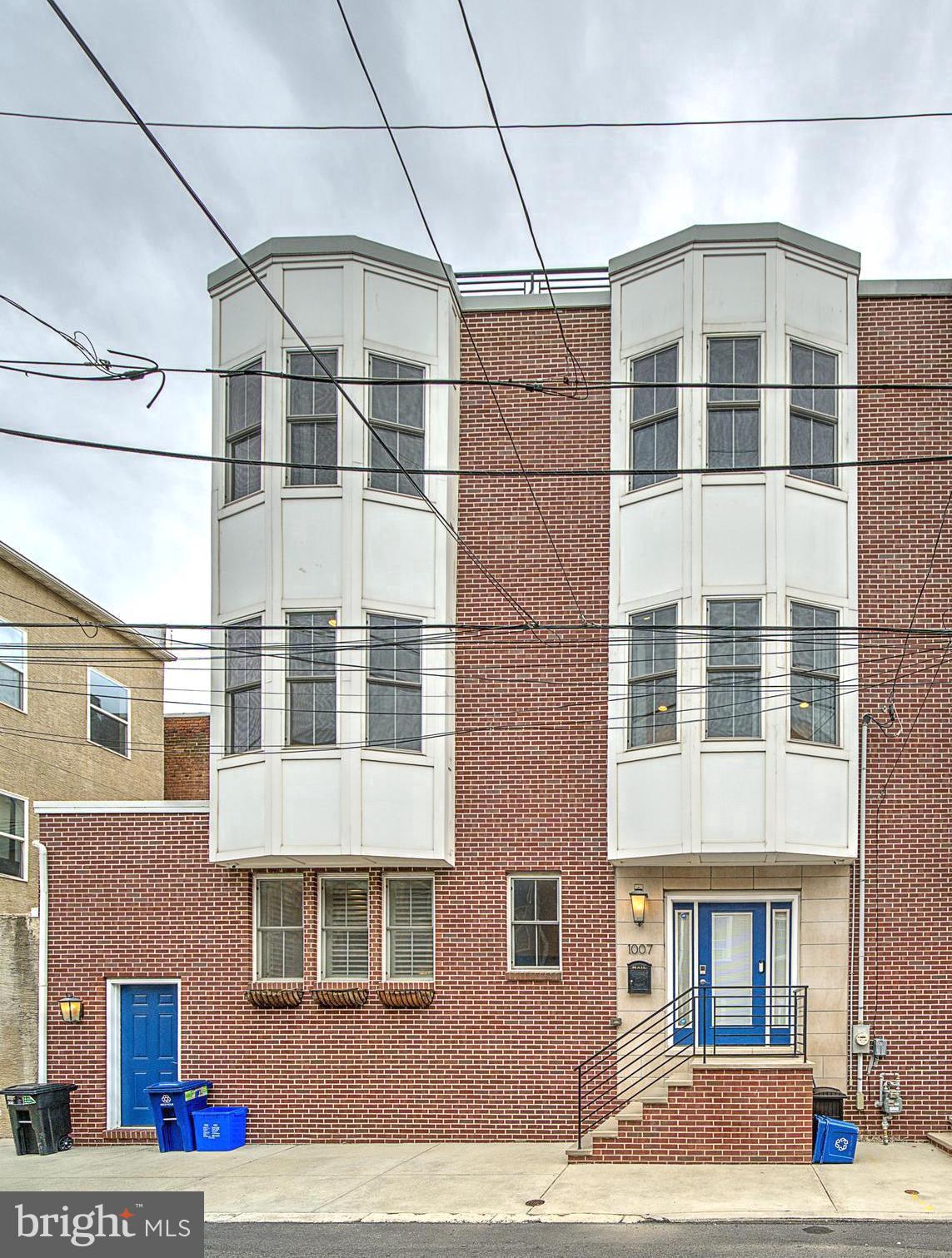 A Rare Find​ in Bella Vista!
If you’ve been searching for the perfect home that checks all the boxes​,​ your search ends here. This extra-wide​ (check the square footage; this is a legitimate 2,400 square foot (not including finished basement) 4-bedroom, 3.5-bath townhome has everything ​you need, plus a few surprises you won’t find anywhere else in the neighborhood.
One of the coolest features? A private, street-access storage room—perfect for stashing bikes, strollers, sports gear, kayaks, and anything else you don’t want to drag into the basement. Super convenient and incredibly rare!​ Inside, you’ll love the spacious, open layout with 9-foot ceilings and tons of natural light. The main floor is made for entertaining or relaxing together​ on a Saturday afternoon—there’s plenty of room for a huge couch and even ​a ​huge TV for game days. The kitchen is sleek and modern with Bosch appliances, 42" cabinets, Carrera marble backsplash, and tons of counter space (you can easily add an island if you’d like even more). There’s also a powder room for guests and access to a shared alley space—perfect for setting up the grill.
Head upstairs and you’ll find two generous bedrooms, a full double-sink bathroom, and a laundry room with a linen closet—no more carrying laundry up and down stairs! On the top floor, there are two more large bedrooms, another full bathroom with double sinks and a spa-style shower, and a sunny balcony that’s great for morning coffee.
And don’t miss the huge roof deck—bigger than anything else on the block! Enjoy amazing views of the Ben Franklin Bridge and ​the Center City skyline. It’s the perfect spot to​ entertain or just sit back and watch fireworks on the 4th of July or New Year’s Eve.
The finished basement gives you even more space—a full bath, tons of storage, and a bonus room that works great as a playroom, office, guest space, or hangout area.
All this in a super walkable location near ​Philly favorites like the Italian Market, Fitzwater Café, Shot Tower Coffee, and great local restaurants like Little Fish and The Saloon.
If you're looking for space, convenience, and a fun​ neighborhood​,​ this is the one. Come see it today!​ Enjoy the benefit of remaining tax abatement time, adding extra value to this already impressive property​.
Don't miss these local spots
Local Parks & Playgrounds - Weccacoe Playground, Shot Tower Playground, Starr Garden
Children’s Programs & Education - Mr. John’s Music, Music Settlement School, Charles Santore Library
Shops & Streets - Fabric Row, South Street, Italian Market, Headhouse Square
Transportation & Access - Quick access to I-95, The Sports Complex, Philadelphia International Airport, Ben Franklin Bridge (to New Jersey and Center City), Walt Whitman Bridge (to South Jersey)