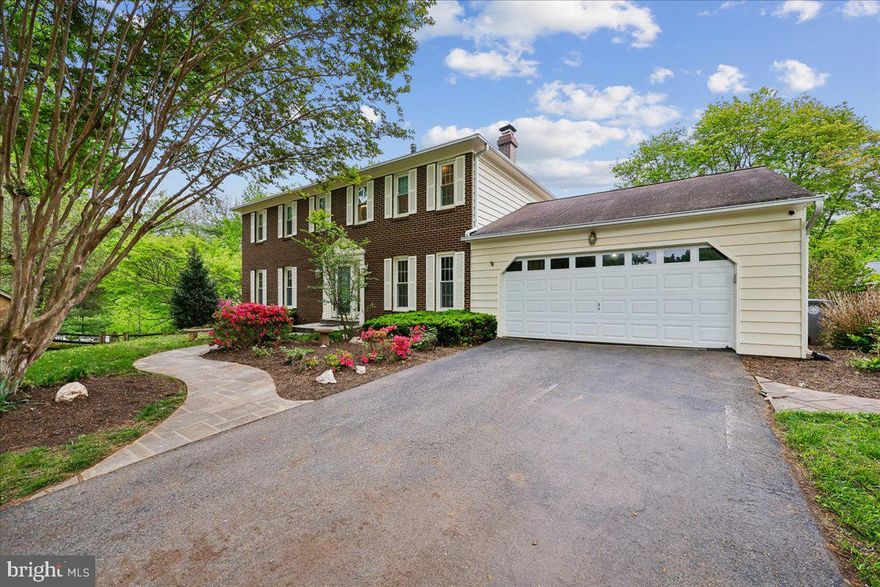 OPEN HOUSE SATURDAY,  MAY 9, 2PM-4PM.  Welcome to this freshly painted 5 bedroom and 3.5 bath home that has been meticulously cared for by its owners. Hardwood floors grace the main level, including the spacious living and dining rooms that are ideal for entertaining. The kitchen features a bright breakfast area and opens to a screened in porch with a new fan, creating seamless indoor/outdoor living. The adjacent deck overlooks a generous fully fenced backyard. Relax in the inviting family room with a wood burning fireplace. A conveniently located laundry and mud room on the main level provides access to the oversized two car garage, along with a powder room.
The upper level offers 4 bedrooms and 2 full baths, including a renovated primary suite with dual vanities, a beautifully updated shower, and two expanded walk-in closets. Hardwood floors continue throughout the bedroom level, along with three additional generously sized bedrooms and a hall bathroom.
The finished lower level includes a recreation room with a wet bar, another fireplace, a private fifth bedroom, and a full bath, making it ideal for guests or a nanny suite. Walk out access leads to the patio, and there is an additional storage room for convenience. The home sits on an exceptional lot featuring an expansive backyard with a garden ready to flourish, a dog run, and a playhouse, making this property truly stand out.