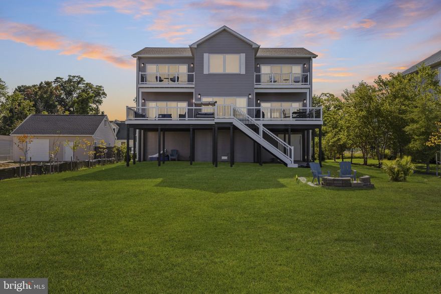 This is the one you've been waiting for!

Welcome to 3675 1st Avenue, a stunning new construction (2024) home located in the desirable Selby-on-the-Bay community of Edgewater with waterfront access and shared pier!

Experience the peace and intense relaxation associated with living on the water in this beautiful new build  which features a wrap around deck and five 12 foot sliding doors that open six feet wide, allowing true inside/outside living. Fall asleep to the sound of the waves crashing against the shore.

The open-concept main level has a large living room (with electric fireplace), dining room, and gourmet kitchen. Kitchen features a ten burner double gas stove/oven and an oversized center island. Laundry and powder room are conveniently located on the main level as well as a full secondary owner's suite!

The upper level owner suite features a walk-in closet and spa-style en-suite bathroom with a 72 inch standalone tub. The generously sized secondary bedrooms get plenty of natural light and have ample closet space. 

The lower level is a two car garage with an enormous amount of storage space. Space under stairs has been fitted and plumbed for a bathroom. 

The large level yard, is ideal for entertaining or gardening. Property has not one but two driveways that will easily accommodate four cars. 

Other Highlights: 

Bamboo flooring throughout
Smart hub light switches
Hot water heater is tankless propane (continuous water 24/7!)
Well and septic are Mayo City

This is a rare opportunity to purchase new construction in one of Edgewater’s most sought-after waterfront communities. Just minutes to Annapolis, major commuter routes, and local marinas. Schedule your showing today!
