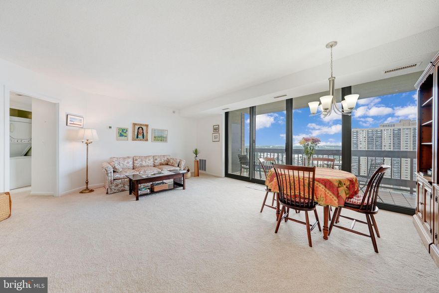 Bright & Updated 2-Bedroom Condo with Full Amenities
Welcome to this bright and spacious 950 sq. ft. 2 bedroom  1-bath condo in the highly desirable Skyline Square community. Floor-to-ceiling windows span the length of the living room, filling the space with abundant natural light.  The renovated kitchen boasts sleek cabinetry, granite countertops, stainless steel appliances, and ample storage—ideal for both everyday living and entertaining guests.
The primary suite features a generous walk-in closet, a washer & dryer,  and an updated full bath.  French doors lead to the second bedroom off the living room.  For much of the year, the expansive balcony offers an ideal space to relax, entertain, and take in the stunning views.

Enjoy resort-style living with access to a wide range of amenities, including a gym, sauna, steam room, outdoor pool with sundeck, library, game and billiards rooms, rooftop lounge, and a 24/7 staffed front desk with security. Additional perks include designated covered parking, guest parking & designated basement storage. A free shuttle provides easy access to the Pentagon and Ballston Metro stations.  Recent Updates: HVAC (2 years), Washer & Dryer (3 years), Kitchen and Bathroom (9 years).