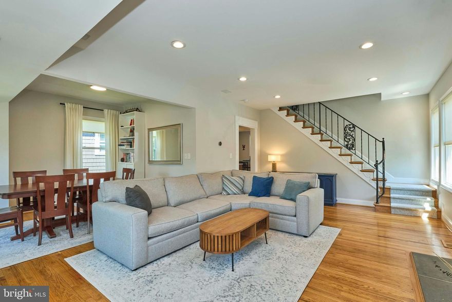 Fresh to the market a charming Dutch Colonial tucked into one of Arlington’s most desirable neighborhoods. A true hidden gem in the heart of Lyon Park—step inside to discover a bright, expanded interior with stylish updates and exceptional livability. This fully renovated 4 bedroom (3 on the upper level, 1 on lower), 3.5 bath gem with 3 finished levels has almost 2,500 finished square feet in an prime location. Nestled on a quiet neighborhood street, it is walkable, bikeable or a short car ride to a host of urban amenities including two Metro stops (Clarendon and Courthouse), the bustling orange line corridor, the shops and restaurants on Pershing Drive, Texas Jacks BBQ,  Bonchon Chicken, the Lyon Park Community Center and playground, Zitkala-Sa park, Rocky Run park, and the Route 50 bike and jogging trail. Extremely convenient to major commuter routes including Washington Boulevard (27), Rt. 50, 10th street N, 1-395, Reagan National Airport, The Pentagon, National Landing  & the Amazon headquarters, and Washington DC.  The detached garage with new door (2024), and a long driveway provide ample parking, and a fully fenced backyard with an inviting patio is perfect  for entertaining family and friends. Inside this jewel is a well designed floor plan with abundant natural light, hardwood floors, and a large living room with a central gas fireplace. The refreshed eat-in kitchen includes new quartz countertops (2023), new backsplash tile (2023), a new sink, faucet and disposal (2023), and a new microwave (2024). The primary bedroom has a beautifully renovated ensuite with a marble vanity countertop, Elfa closet shelving, and plenty of storage, and the upper level hall bath was thoroughly renovated in 2022. The lower level has an interior and exterior entrance,  LVP flooring (Coretec Pride Oak), a generous sized family room/4th bedroom, bonus office space, and a third full bath. The adorable lower level laundry room includes a farmhouse sink & cabinet, ample shelving, and custom butcher block counters over the washer/dryer. Everything you could ask for is in this hidden gem that opens to a spacious, beautifully maintained interior that’s perfect for today’s lifestyle. Nothing to do but move in and enjoy!