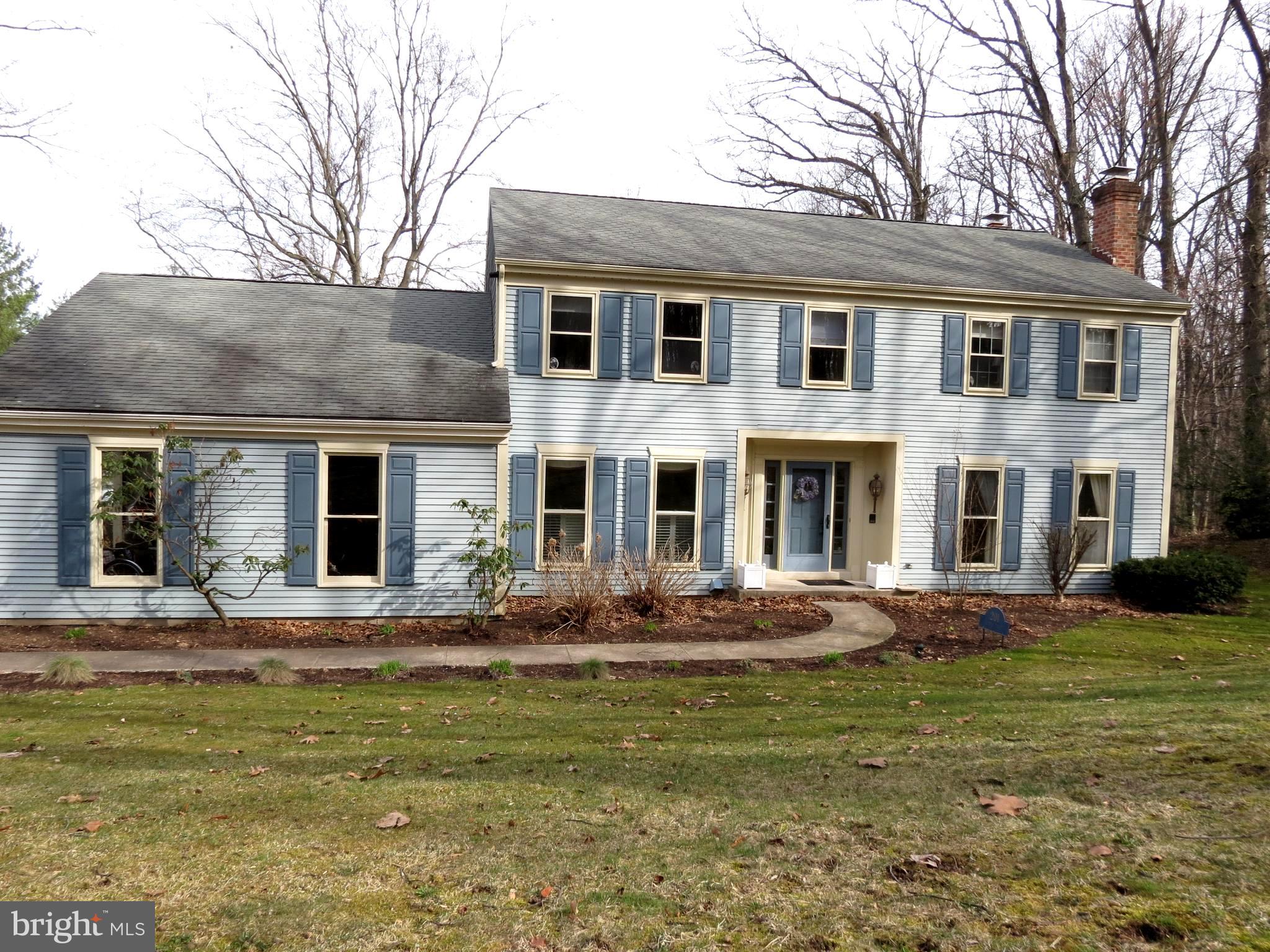 Tucked on a corner inside Laurel Woods, this beautiful Colonial boasts over 3,800 sq/ft of Finished Living Area. 2 gas masonry fireplaces, bright and cheery Sun Room with vaulted ceiling/skylights/casement windows so you can let the winds flow through. Large Dining room for family gatherings, private first floor office space, fenced yard so you don't "See Spot Run" run down the road, finished lower level for game nights, convenient first floor laundry with shoot, many mechanical updates/upgrades. 3% Seller Help with full price offer ($11,085) Hope you like it when you come for your tour.