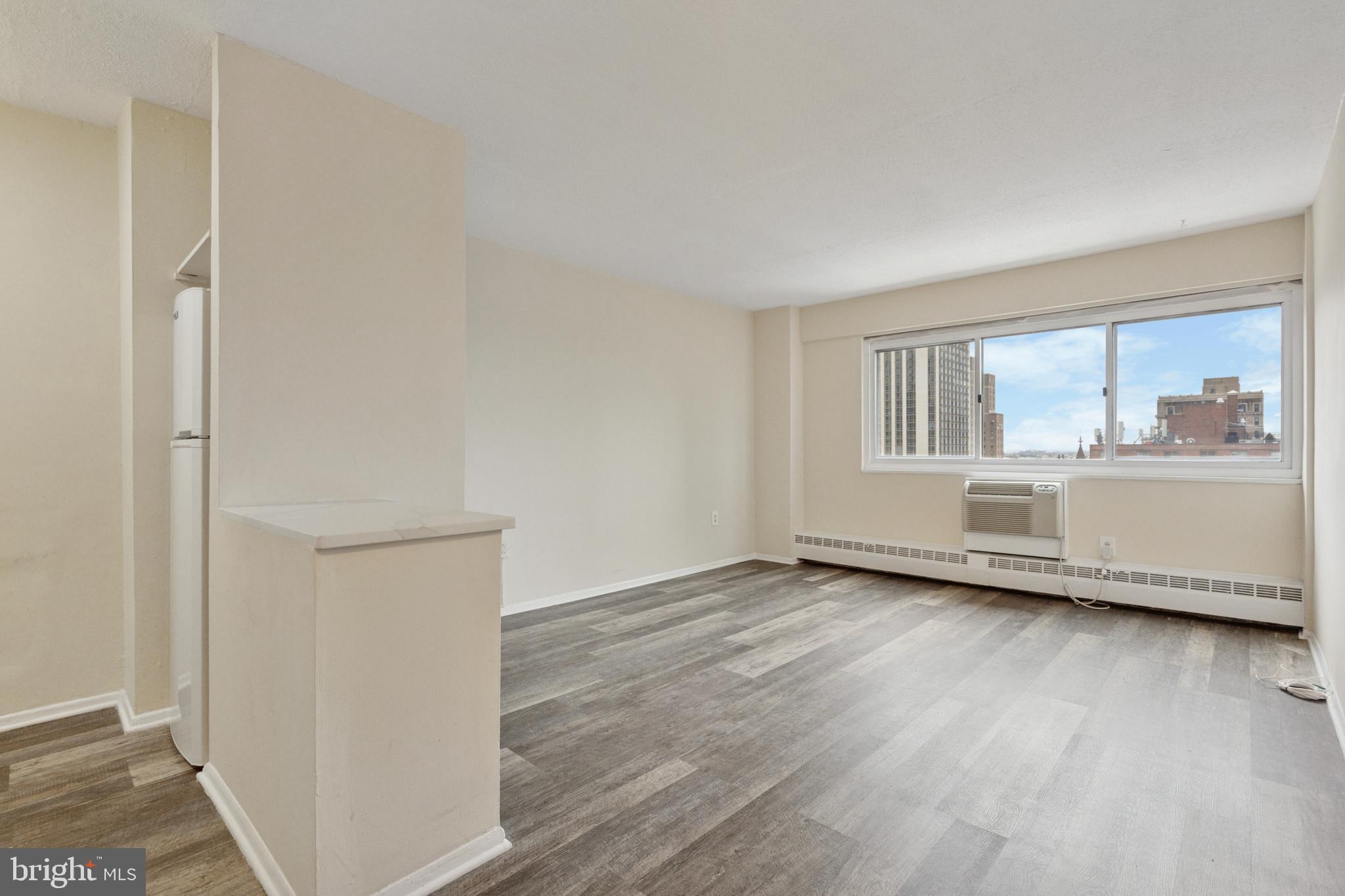 Enjoy sweeping views and convenient city living from this one bedroom, one bath condominium with ALL UTILITIES included. Located on one of the upper floors of the building, this unit features premium unobstructed southern exposures and views of the Rittenhouse neighborhood. A galley-style kitchen has been updated with quartz counters, newer appliances, gas range, white subway tiled backsplash, and a convenient breakfast bar/island. A generously proportioned bedroom is carpeted and features great closet space. River West Condominium is a pet-friendly building and the monthly fees include a 24-hour front desk, secured entry, fitness center, resident's lounge, on-site management, and ALL UTILITIES (gas, electric, water, and basic cable). The building also has direct access to a private parking garage, which offers monthly garage parking at an additional fee (based on availability). Located in the Rittenhouse Square neighborhood, this home is blocks away from some of the best of Philly's dining and retail scene, world-class museums and cultural attractions, and is convenient to public and mass transit, Penn, Drexel, and more! * Photos are from another unit with identical floorplan and view, w/slightly different finishes (photos will be updated after tenant is moved out).