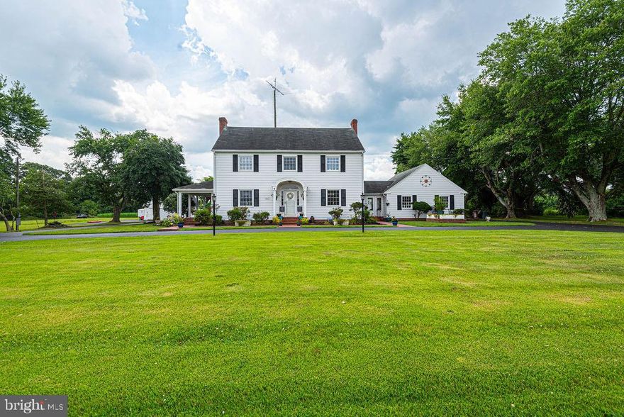 Updated Price  Adjustment on this quintessential 4-acre farmette ideally located between Salisbury and Ocean City on 34339 Old Ocean City Road, Pittsville, MD. Constructed in 1950, this colonial revival home has been lovingly renovated several times to reach its current form of spacious and tranquil charm. A warm and welcoming foyer greets guests beckoning them to come in and make themselves at home. Original hardwood floors flow through the heart of this home, giving character and a sense of heritage to each room. Enjoy the generous size of the living room with a fireplace and access to a covered veranda. The enclosed breezeway is a charming architectural feature that connects the garage with the main house and could be functional as a semi-outdoor space for hanging out, dining area, storage or mudroom. It’s all a matter of how you want to transform the space into something you like and enjoy. Turn the 1,120 sq. ft. unfinished basement to a finished space for a media room, office, gym or game room. The basement is currently used for laundry facilities and makes easy access to the mechanical systems. Spacious bedrooms are on the second story. Additional storage can be found in the full walk-in attic, complete with a cedar walk-in closet.  Sprawling yard with an above-ground pool and jacuzzi hot tub. In-ground sprinkler system. Town zoning allows for this parcel to be subdivided and content to public sewer and water. Near Pittsville Elementary/Middle School & Box Car 40 Restaurant. If you have been dreaming of country life yet want space, light and modern conveniences, this is it!