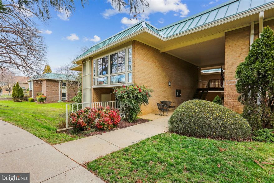 Live here - at Leisure World, the premier 55+ gated senior living community!   This 1,103 sq ft (largest 1 BR model) coop is ready for new owners to move right in. Updates include the freshly painted interior, new luxury vinyl plank flooring (looks like wood & cleans easily!) in the living & dining rooms, new carpet in the bedroom, and granite tops in the kitchen. The bath also received updates and is adjacent to the laundry area, with a full-size washer and dryer. Sliders to the ground-level patio and utility closet make it easy to enjoy the afternoon sunshine and chat with neighbors out for a stroll. The parking lot is close by with #27, the designated parking spot for this residence, and ample guest parking is available. The low $960/month coop fee includes utilities (electric, water/sewer, basic cable & internet package, property taxes (woo hoo!), master insurance, management, reserves, grounds & building maintenance, plus maintenance, repair and even replacement of the HVAC system and appliances! Leisure World amenities include 24-hr gatehouse & security monitoring throughout the campus, many community clubs, events & meeting rooms, walking/jogging paths galore, two clubhouses (with dances, speaking engagements & concerts), two pools (indoor & outdoor), fitness center/gym, golf course, putting green, library, game room, billiards & ping pong room, tennis & pickle ball courts, movie theater, restaurants, live music & events, free shuttle bus service and so much more!!