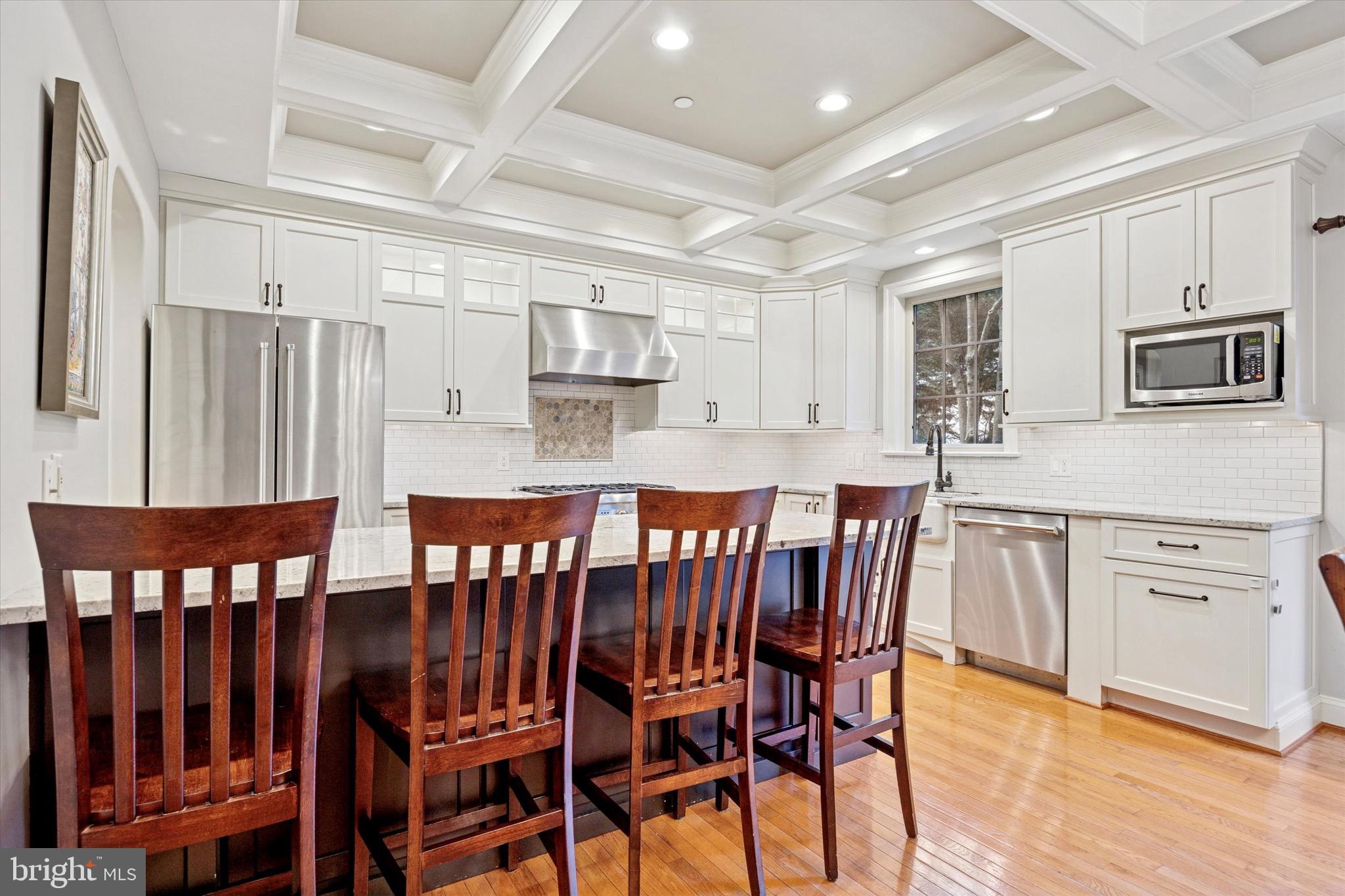 Magnificently Renovated Townhome in the Heart of Media Borough
Welcome to 121 Valley Place—a stunningly renovated 5-bedroom, 3.5-bathroom townhome nestled in the vibrant heart of Media Borough. This exquisite home offers the perfect blend of timeless charm and high-end finishes, all within walking distance to shops, dining, and everything else the neighborhood has to offer.
Step into the main level and experience the seamless flow from the spacious living room into a show-stopping kitchen. Featuring coffered ceilings, elegant ivory cabinetry with soft-close drawers, an 8-foot peninsula with seating, Level 3 granite countertops, an apron-front farmhouse sink, a professional-grade Thermador range and dishwasher, and a dual-zone beverage cooler—this kitchen is designed to impress and entertain. A dining area off the kitchen overlooks the deck, offering the perfect indoor-outdoor connection.
The wide-plank hardwood stairs lead to the second floor, where the luxurious primary suite awaits. This serene retreat features a cozy gas fireplace and a spa-inspired marble bathroom complete with a 6-foot shower, three shower heads, three body jets, dual vanities, built-in closets, and radiant heated floors. A second bedroom or ideal home office completes this level.
Upstairs, the third floor offers three generously sized bedrooms and another beautifully renovated marble bathroom with heated floors—perfect for family or guests.
The fully finished walk-out lower level adds incredible versatility with a large living area, a full bathroom, and access to a covered lower deck—ideal for relaxing or entertaining. An unfinished section provides ample storage space.
This home also features a rare, detached 2-car garage and is part of a well-maintained HOA, giving you peace of mind with included exterior maintenance and repairs.
Don’t miss your chance to own this extraordinary residence in one of Delaware County’s most desirable locations. Schedule your private showing today!