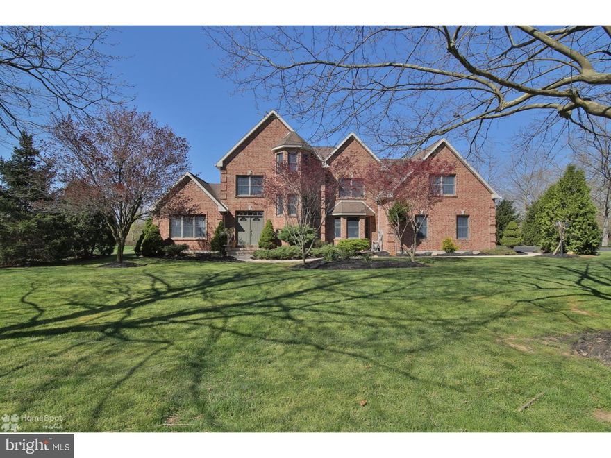 No expense was spared nor detail overlooked in this custom built entirely brick Home  Sweet Home.   Nestled on over 1.2 acres at the end of cul-de-sac in the Parkland SD.  The double entry door opens to a beautiful foyer with custom stone work & leads into stunning formal living room w/cathedral ceilings with a wall of large windows & french doors that open to a stone patio and offers breathtaking view of yard & fields beyond. Red Pine hardwood floor & crystal chandelier complete this elegant space. The kitchen features stainless steel appliances cherry cabinets &a large center island with gas stove top & additional sink. Double mahogany doors lead to form dining room with fireplace & vaulted ceiling. The family room features French doors to yard & vaulted ceilings.  Tower staircase leads to 2nd level with family bath, master suite w/ master bath w/spa tub & double vanity sink, walk-in-closet & additional closet. 2 spacious family bedrooms and large linen closet complete the 2nd floor. . The 3rd floor features a large 4th BR beautiful  views.  Other feat includes a partially finished basement, central vac, bidets, skylights, alarm, reverse osmosis, 2 zone AC , 3 car garage & more.  Easy access to major highways.