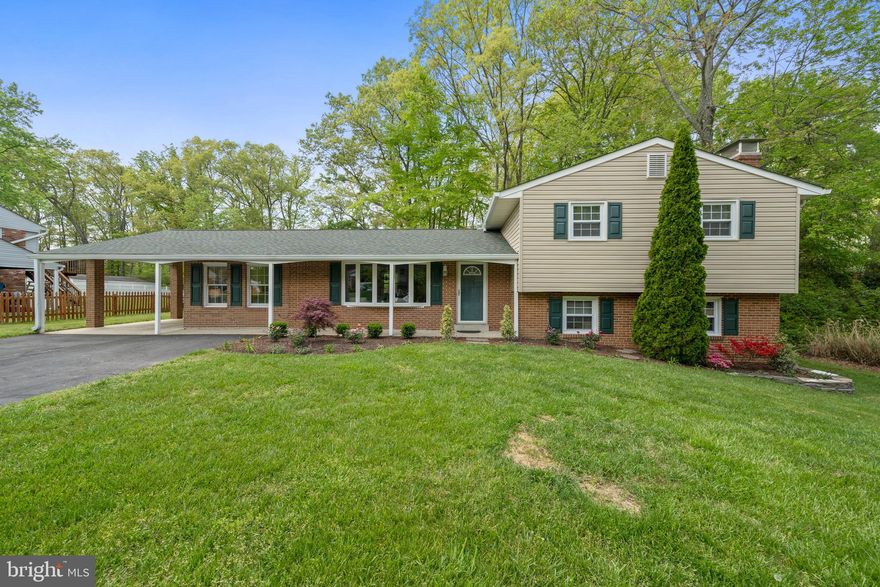 Welcome home to this meticulously maintained 3-bedroom, 3-bathroom, split-level offering an abundance of charm and functionality! The inviting curb appeal with fresh landscaping and cozy front porch sets the stage for a warm welcome as you enter the front door. Entryway leads you into the living room with hardwood floors and a beautiful bay window installed in 2020 filling the space with tons of natural lighting. The dining room seamlessly connects to the living room and to the kitchen. Spacious family room off dining room allows for plenty of space for entertainment. The kitchen features a breakfast nook, built-in microwave, refrigerator, dishwasher, and sliding glass doors off kitchen leads to the beautiful brick patio put in a few months ago! Make your way upstairs to 3 nicely sized bedrooms, each equipped with ceiling fans to ensure comfort year-round! The primary bedroom has dual closets and a connected full bathroom. Upstairs also includes a full hallway bathroom. Bring the party to the lower level which boasts a large open rec room/second family room with built in shelving, a wood-burning fireplace with a timeless brick wall, perfect for cozying up in the colder season! Off the rec room is the expansive laundry room with luxury vinyl plank flooring with a wash sink, a third full bathroom, door leading to outside, and a utility closet with built-in workspace. Updates include roof (2020), oil furnace (2019), A/C (2019), brick patio (2023), chimney & new fireplace insert (2024) newer appliances & windows, fresh paint, laundry room LVP (2021), lower rec room flooring (brand new). This amazing home in a great neighborhood with NO HOA will not last long, schedule your showing today!