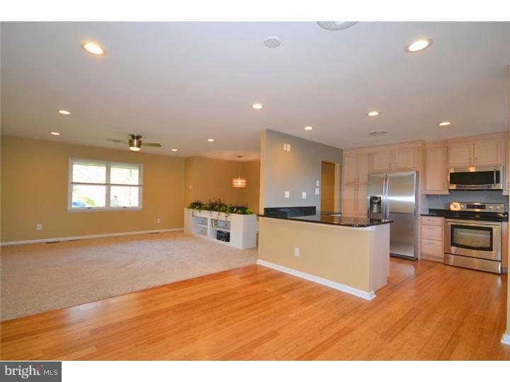 Welcome to this beautifully updated 4 bedroom 3 1/2 bath home in Great Valley School District.  When you pull up you'll notice the crisp clean manicured home which is consistent throughout the inside. This is a gem. The pride in workmanship shows throughout this bright & convenient open floor plan that all buyers are demanding.  Stop by and enjoy so you can imagine yourself in this great home. You have 2 master suites with full baths to choose from. One on the main floor & the other on the lower level which is large enough to be considered a possible in-law suite with it's separate entrance via new French doors. The main level offers a brand new kitchen from the maple cabinets, granite counter tops, high efficient stainless steel appliances & bamboo flooring that leads into the dining room and opens to the living room. Recessed lighting has been added along with the new lighting fixtures.  Enjoy the open plan for great entertaining or just being together. There are 3 bedrooms on the main level incl. one the masters. All rooms have brand new carpeting, freshly painted walls, ceilings & doors. The hall bath has been completed renovated with everything new even a soft close commode! The master bath has a new shower, vanity & soft close commode. The lower level great room has also been completed updated with new carpet, paint & recessed lighting along with a nice size updated half bath. The wood burning stove has a heating unit that can actually heat the entire home...Great for utilities. The laundry room & the LL master is also on this level. This master offers a huge master bath with Jacuzzi tub. 3 new French doors with internal blinds are a breeze for cleaning. They all give you access to the beautiful backyard from the dining room to the deck, the LL great room to the patio & LL master to the patio. Once you get outdoors you'll feel like you're in the country with breathtaking backyard views yet so close to major highways, shopping, corporations & a 5 minute drive to downtown Phoenixville's restaurants & pubs.  Some of the important features incl. a 24x14 insulated shed great for storing yard eqp. or craft shop.  Added insulation in the attic( no drafts in this home) hot water heater 1 yr new, 2 HVAC units plus baseboards in 3 BR's for extra supplemental heat but owner never uses. High end dimensional roof installed 3 yrs ago w a 22 yr warranty left. Brand new well pressure tank & 2 yr new well pump