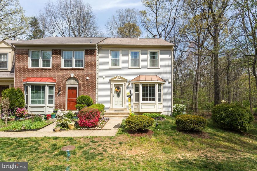 Spacious Bright end unit townhouse with light gleaming in from all angles with hardwood floors on the main level, beautiful large deck, Freshly Painted. Updated Kitchen w/back splash & SS Appliances, New tiles and granite countertop. Recessed Lights in Living Room and Basement with a fireplace and a bedroom, full bathroom and large back yard. Walking distance to VRE, shopping & Lake Royal.