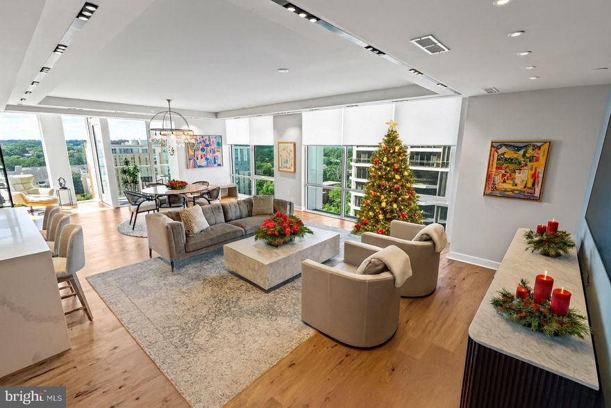 There's no place like The Pierce for the holidays!  You'll feel like you've gone away on a winter holiday without living the building!  Experience resort-style, turn-key luxury at The Pierce, Rosslyn’s premier full-service condominium and most coveted address. Residence 1201 spans the entire west end of the building with private, direct elevator access and floor-to-ceiling windows that provide sweeping skyline and sunset views.<br><br>Inside, three bedrooms and two-and-a-half baths are anchored by a chef’s kitchen with a Thermador appliance suite, wine refrigerator, Snaidero cabinetry, and polished quartz countertops with a waterfall island. The serene primary bath features heated marble floors for a spa-like start and finish to each day. A separate laundry room adds single-family convenience, while a private balcony invites alfresco coffee or evening cocktails with westward vistas. Two premium garage spaces convey—one with an EV charging station.<br><br>The Pierce delivers resort-style living with a true full-service experience, beginning with a friendly 24/7 concierge to manage arrivals, deliveries, and guest services. A dramatic rooftop terrace showcases monument and Potomac River views, with dedicated zones for grilling, open-air dining, and fireside lounging. In season, a 65-foot rooftop pool with cabanas and an outdoor bar turns weekends at home into a getaway. For entertaining or remote work, the penthouse-level Owners’ Club offers a fireplace, multiple seating areas, and a bar which may be reserved for private, catered events. Wellness is anchored by a two-story fitness center with a dedicated yoga room and a full suite of Hoist and Matrix equipment plus free weights. Everyday conveniences include secure bike storage, EV charging stations, a conference room for business meetings, and a pet-washing station in this pet-friendly building.<br><br>The Pierce’s prime location enjoys a Walk Score® of 96, with most daily essentials—grocery, pharmacy, fitness, and coffee—just moments away. Arlington’s own scene is vibrant, with dining and cocktail bars in Rosslyn, Courthouse, and Clarendon nearby. Just across the Key Bridge await Georgetown’s boutique shops and restaurants as well as DC’s world-class cultural destinations like the Kennedy Center. Recreation enthusiasts will love easy access to parks and trails for walking, running, and biking. For movement across the region and beyond, you’re just blocks to Rosslyn Metro and minutes to the GW Parkway, I-66, Route 50, and I-395, placing downtown DC, National Landing, Tysons, and DCA within easy reach.<br><br>Whether you’re seeking a full-time residence, an elegant pied-à-terre, or a savvy investment property, The Pierce offers a refined lifestyle and enduring value in one of the region’s most desirable destinations. (For more details about building/area amenities see the highlights sheet that accompanies this listing).