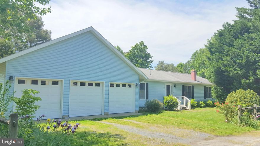 Not just a 3 BR 2 Bath Rambler. This house has a HANGAR for your personal airplane!  Located on a private airstrip with magnificent view, this house has been loved as a seasonal home.  Huge covered deck on the back, fireplace in the living room, split floor plan has master on one end with soaking tub and sep. shower.  Open bright kitchen with breakfast bar. Shed included. Beach front community