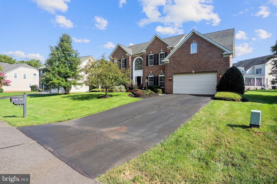 Welcome to 14102 Mary Bowie Pkwy where Luxury, Lifestyle and Location abound.  This Exquisite home is in the Premier Prince George’s Golf Course Community of Oak Creek and boast 5 Bedrooms, and 5 full baths.  Enter the gates of this private community to find your destination at one of the largest colonials in the community.   The home is situated on a vibrantly green lot nourished by an in-ground sprinkler system that keeps the lawn and lush landscaping pristine.  Enter into a 2-story foyer and feel the grandeur of this home.  The first level is complete with formal living and dining rooms, a magnificent sunroom, butler’s pantry, gourmet kitchen with granite counters, upgraded cabinet package, gas cooktop, double wall ovens, stainless steel appliances, a generous center island that allows for extra food prep space, a bar height counter with seating for 4 and a sunlit morning room off the kitchen.   Next to the kitchen is a Huge 2 story family room that’s perfect for those large family gatherings and a lovely solarium when you want to slip away from the crowd.  There is also a 1st floor bedroom that can double as an executive office.  The 2nd level is complete with 4 other bedrooms to include a luxurious Master suite with ensuite bath. The layout was thoughtfully planned with plenty of room for a King size bed and all the extras.   No fussing over who gets the biggest closet here.  This Master has 2 large walk-in closets and a cozy sitting area.  The Master Bath offers everything any King and Queen could ask for…A large soaking tub, generous shower, double vanities, and a separate water closet.    There is another large bedroom with an ensuite bath and 2 more bedrooms that share a jack and jill. There is plenty of room here for a large or growing family.  The basement is partially finished with a large rec room for entertaining.  There is plenty of storage and dedicated space for your Dream Media/Theater room.  This home has hardwood and Bamboo flooring through the first and 2nd levels, upgraded lighting and plumbing fixtures throughout the home and custom wood blinds.  Community amenities include 24-hour on-site security, an 18-hole Ault Clark designed championship golf course, with pro shop and on-site dining at The Grove Restaurant.   The community also has a clubhouse with swimming pool, fitness center, tennis courts, walking and biking trails, playgrounds and tot lots, a lake with fountains and much more.  This is Prince George’s County at its Best!