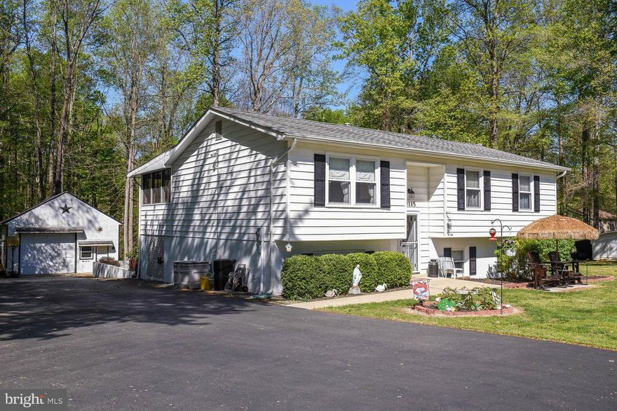 Spacious well maintained home in Rolling Acres.Almost 2.5 acres. Large detached Garage w/electric, water and plenty of space for the mechanic.Oversized paved driveway. Shed for additional storage Home features 5 bedrooms, 2.5 baths,  All Season Room just off of the dining area. Updates throughout including windows,roof, HVAC, flooring.  This home is ready for you to move right in. Don't miss it!