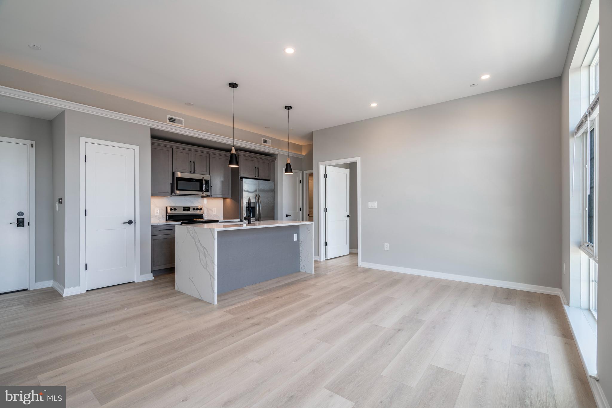Welcome to Innovator Village, nestled in the heart of Graduate Hospital! This gated community is home to 82 newer construction, luxury units featuring top of the line finishes. 2401 Washington Ave offers everything you could desire in a city apartment and can be moved into as soon as May 1st. This unit features a spacious, open living room with huge south-facing windows and lovely natural light, a kitchen with quartz countertops and stainless steel appliances, two large bedrooms, two beautiful bathrooms, hardwood floors and an in unit washer/dryer. The building also features an elevator, beautiful brick exterior, and commercial space on the first floor Innovator Village is located on the bustling Washington Ave corridor with easy access to Drexel University, CHOP, Penn University, I76, restaurants, shops, public transportation and much more! On site parking is available for lease for $300/month (currently no availability but we expect additional availability this summer).