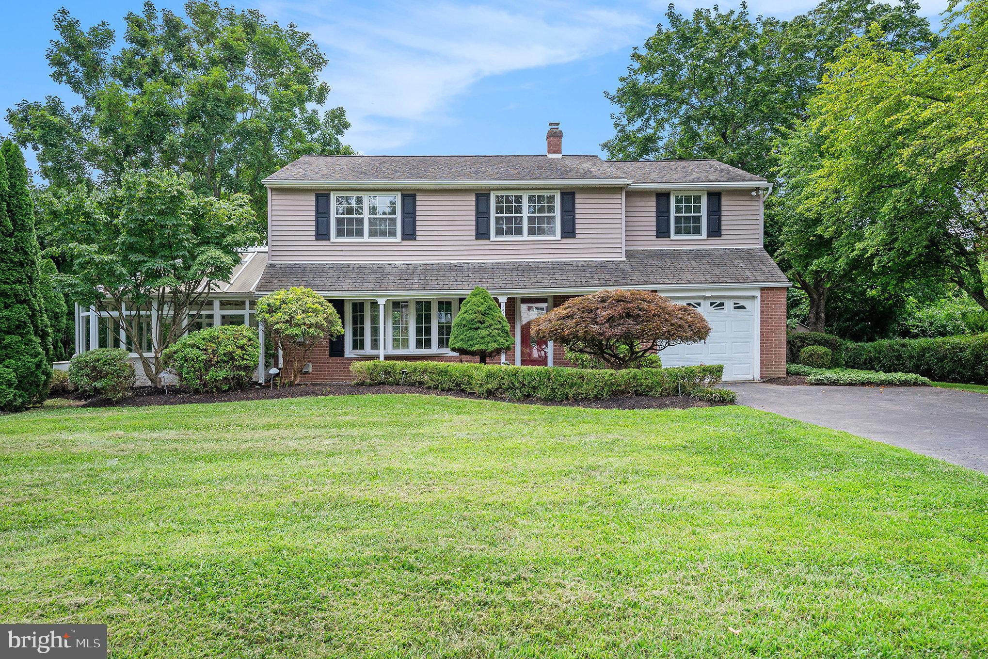 Nestled on a beautifully landscaped, mature lot, this charming Blue Bell Colonial offers a perfect mix of traditional style and everyday convenience. Inside, gleaming hardwood floors and classic wainscoting set the tone in the foyer, leading to a bright and spacious living room anchored by a cozy gas fireplace and a charming bay window. The heart of the home is the recently updated kitchen, featuring crisp white cabinetry, gas cooking, recessed lighting and convenient bar seating. An open dining area flows seamlessly from the kitchen, creating the perfect space for everyday living and entertaining. Upstairs, the spacious primary suite features two walk-in closets and a private, updated bath and is accompanied by three additional bedrooms and a full hall bath. The partially finished basement offers flexible space for a playroom, home office, gym, or media room, along with storage shelving in the utility area. A spacious sunroom opens to the private backyard—ideal for relaxing, gardening and entertaining. Enjoy the benefits of a prime Blue Bell location within the highly rated Wissahickon School District, just minutes to popular shopping and dining at Center Square Commons, nearby parks and the Whitpain Greens Swim Club. Commuters will appreciate easy access to major routes including I-76, Route 476, the PA Turnpike, and the Northeast Extension. This home checks all the boxes—location, lifestyle, and comfort. Don’t miss the opportunity to make it your forever home!