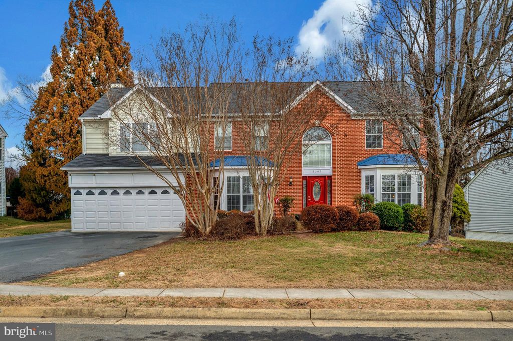 Photo of 9309 E Carondelet Drive, MANASSAS PARK, VA 20111 (MLS # VAMP2003620)