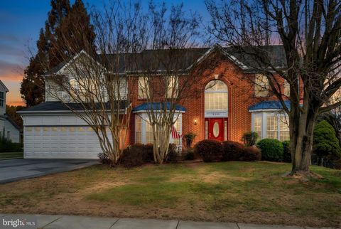 Photo of 9309 E Carondelet Drive, MANASSAS PARK, VA 20111 (MLS # VAMP2003620)