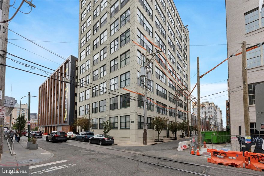 ** Presenting #204 ** at the Old Shoe Factory ** Loft living is at its finest in this bright, one bedroom/one bathrom unit. Get ready to experience the true definition of natural light in this 2nd-floor condominium residence - perfect for indoor plants! The 14-foot ceilings give this unit a vibe like no other. Feel the history of the city in this open floor plan with industrial style cement columns, original hardwood floors, and exposed brick. The Old Shoe Factory is located in the vibrant loft district, steps from the ever-expanding rail park with easy access to the Broad Street Line, the Vine Street Expressway, and the Ben Franklin Bridge. It is also walkable to all points of the city (Northern Liberties, Washington Sq, Chinatown, Olde City, Rittenhouse Square). All of your grocery shopping is just a few short blocks away at Reading Terminal Market and Trader Joe's, plus walk to neighborhood favorites: Wood St. Pizza, Cafe Lift, Prohibition Tap Room, Trestle Inn, Elixr Coffee, El Purepecha, The Cliffs (rock climbing gym), Love City Brewing, Triple Bottom Brewing. Experience the low maintenance and stress-free lifestyle of living in a condo with low monthly fees. Schedule your showing today and see all that this great unit has to offer!