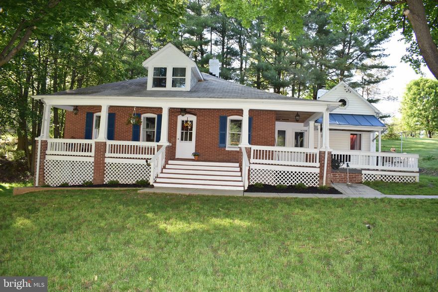 Don't miss this RARE FIND!  7.91 acres in Manchester. Come see this beautiful property . This 1920 cape cod with big front porch sits off the road and features 3 bedrooms with a possible 4th and 2 full baths. New mini split A/C and heat pump combined installed in 2020 on main floor. There is also oil /hot water baseboard heat through out.   Unfinished basement with 2nd finished full bath. Great for coming in from outside with the animals or just for entertaining on this wonderful property.  New stainless steel appliances in kitchen and granite countertops in the cooking area. Laundry on main level to  make chores a little easier. Hardwood flooring throughout except in kitchen where laminate floors were installed in 2020.  Cozy up near the stone fireplace with freestanding wood stove. New liners in fireplace and furnace chimney installed in 2018. Whole house water filter  installed in 2017 and new well pressure tank installed in 2020. Recessed lighting and ceiling fans in some areas. There are 2 fenced pastures with a newer 3 stall run in shed with 10x10 stalls and chicken coop with run approx. 8x24.  2 story bank barn with stalls and 2nd story for storage or keeping hay along with several other sheds/outbuildings. Barn and some sheds have outside electric.   Driveway has gate for more privacy. Plenty of room to bring your animals or if you just want to have a beautiful pastoral view from the front porch, this home is for you!   Priced to sell!