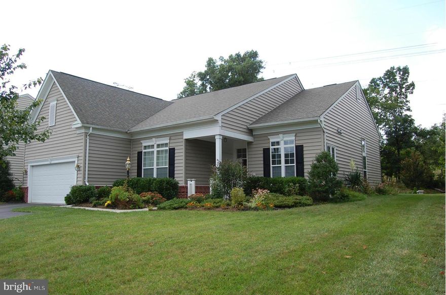 Stunning 3bd home on quiet cul-de-sac with all the amenities of the prestigious Dunbarton 55+ active community. This beautifully landscaped premium lot backs to parkland on 2 sides.The spacious main living floor plan has sun filled rooms, 9+ceilings & gleaming hard woods. Kitchen boasts 42" cab,granite counters,gas cooktop, 2 ovens & breakfast nook. W/I closets, sprinkler sys, Lndry, 2 car garage.