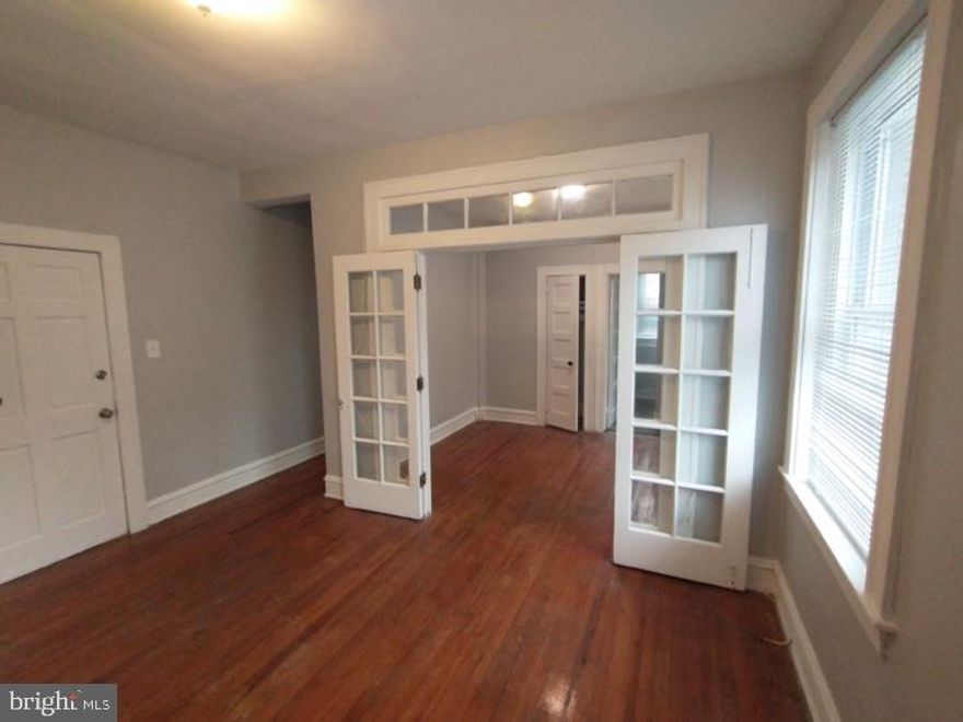 1 bedroom 1 bathroom apartment. 

This light-filled apartment offers peaceful views of State Center and a low-maintenance layout—perfect for easy city living. Enjoy hardwood floors, high ceilings, and large windows in a charming mid-rise building with secure keyless entry and Amazon Hub for packages.

Located in Hampton Court Apartments, just steps from MICA, UBalt, UMMC, Mount Vernon, and public transit including Metro, Light Rail, and Penn Station. Virtual tours available. Students welcome.

Heat & water included in flat monthly fee. BGE separate.